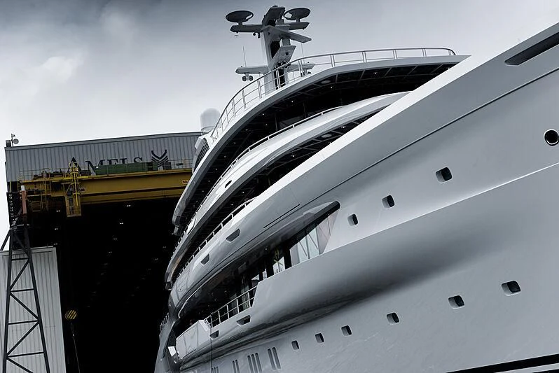 a large cruise ship docked aboard ENERGY Yacht for Sale