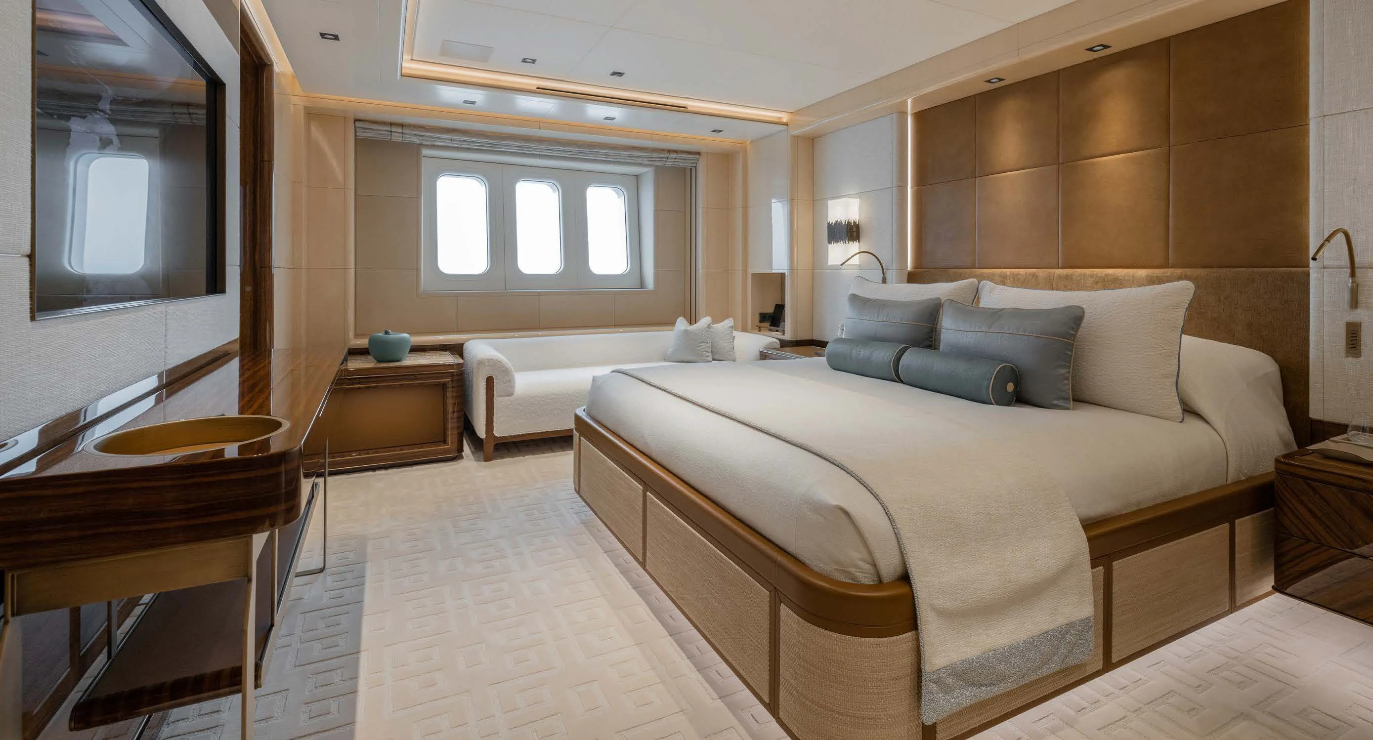 a room with a bed and a desk aboard ENERGY Yacht for Sale
