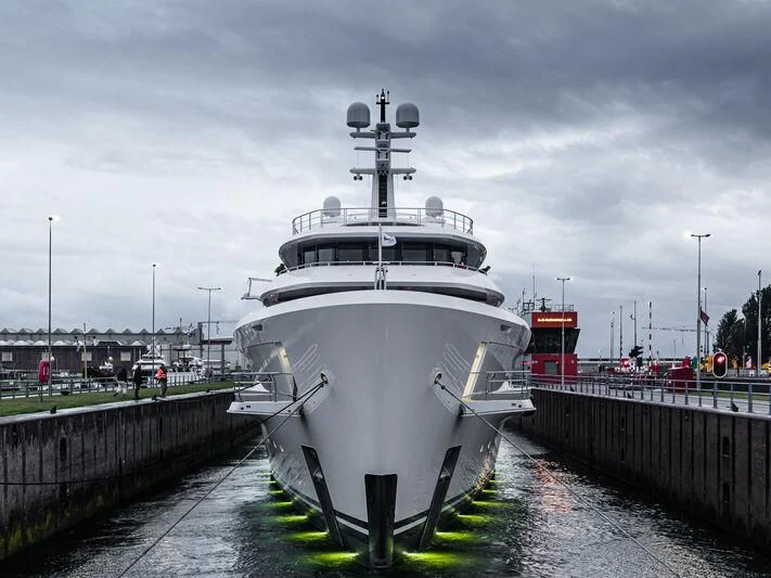 a large white ship docked aboard ENERGY Yacht for Sale