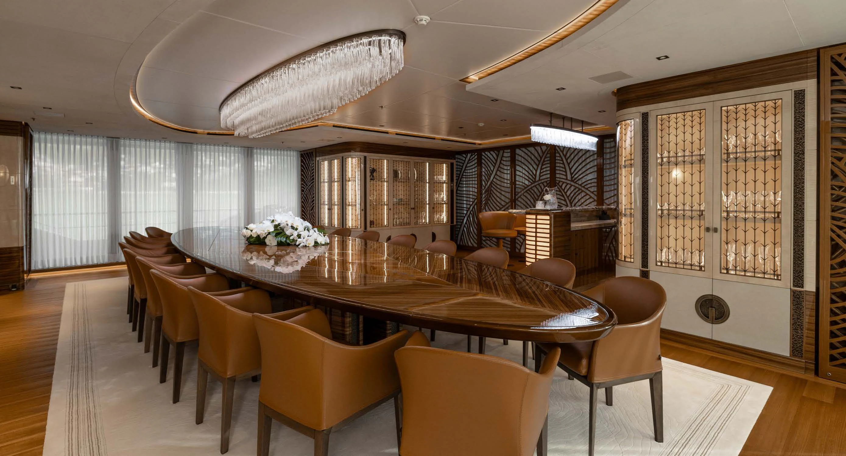 a large dining room with a large table and chairs aboard ENERGY Yacht for Sale