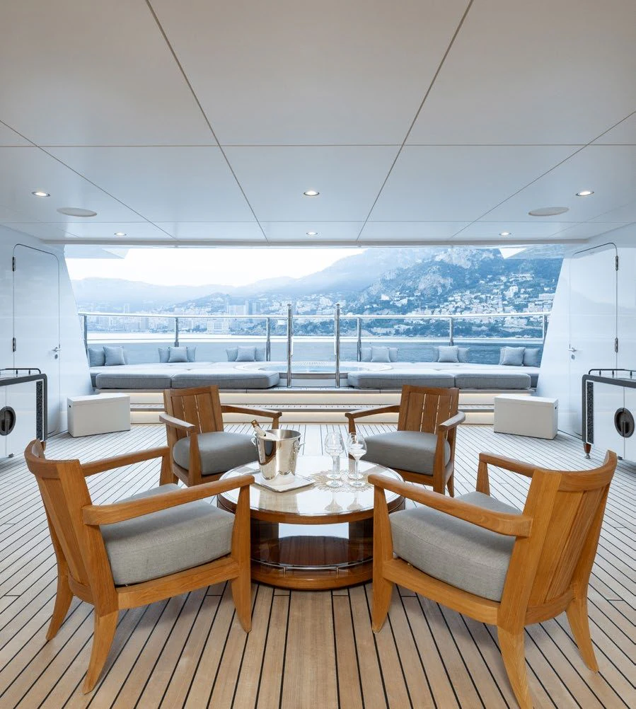 a room with tables and chairs aboard ENERGY Yacht for Sale