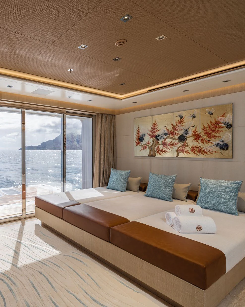 a bed with a bench aboard ENERGY Yacht for Sale