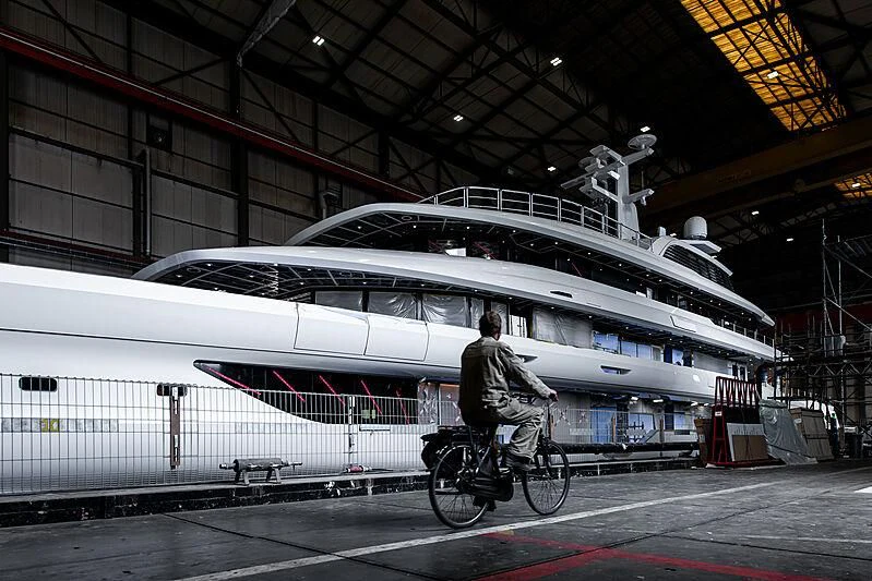 a person riding a bicycle in a train station aboard ENERGY Yacht for Sale
