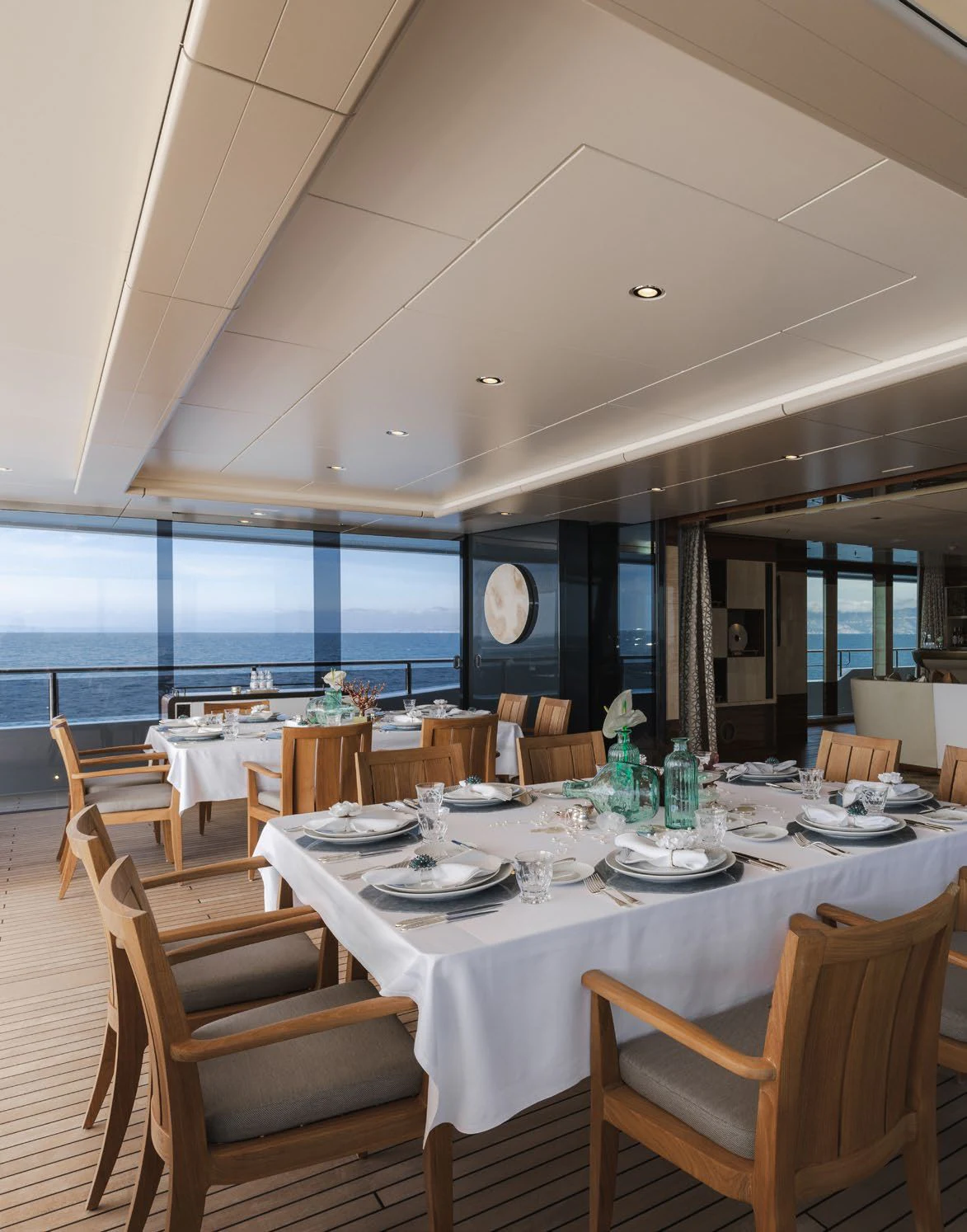 a dining room with a large window aboard ENERGY Yacht for Sale
