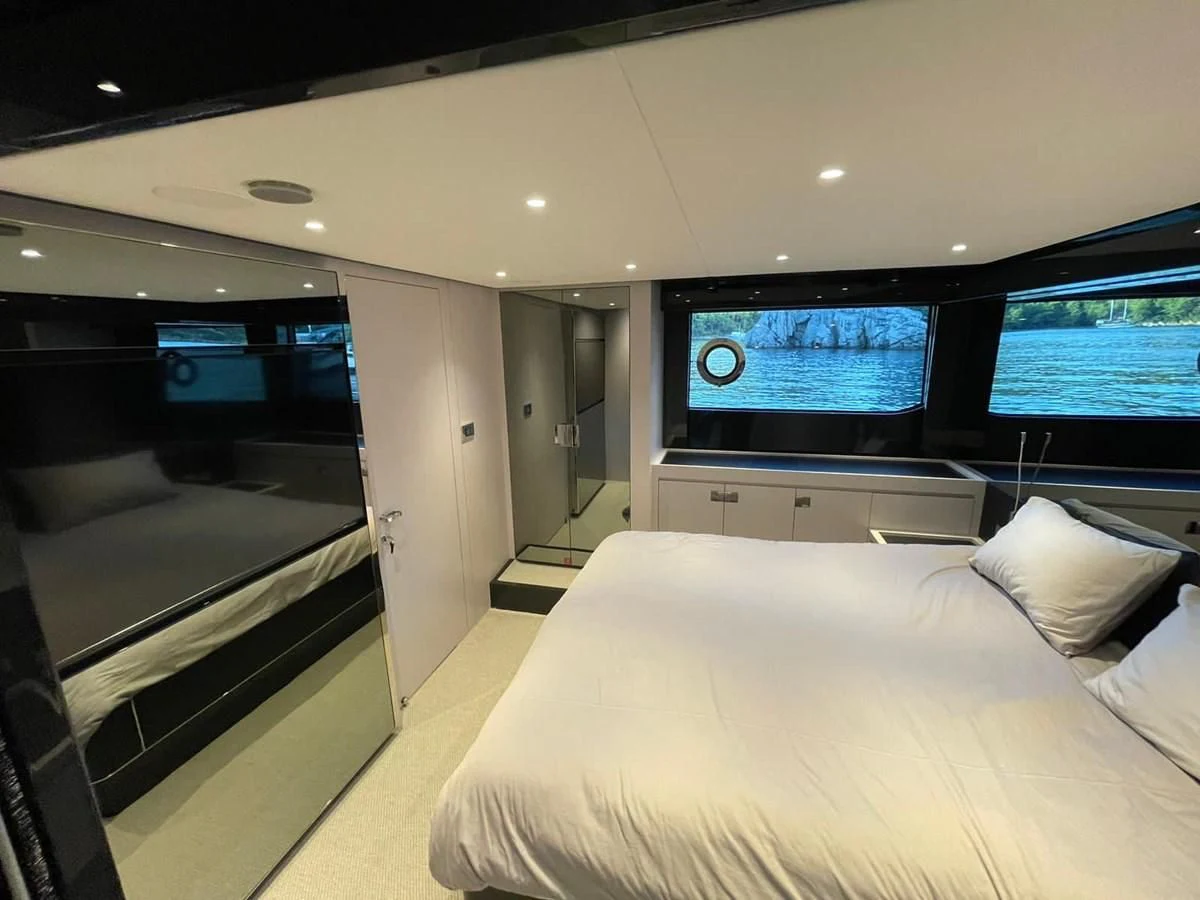 a bed in a room aboard RIVA 68' DIABLE Yacht for Sale