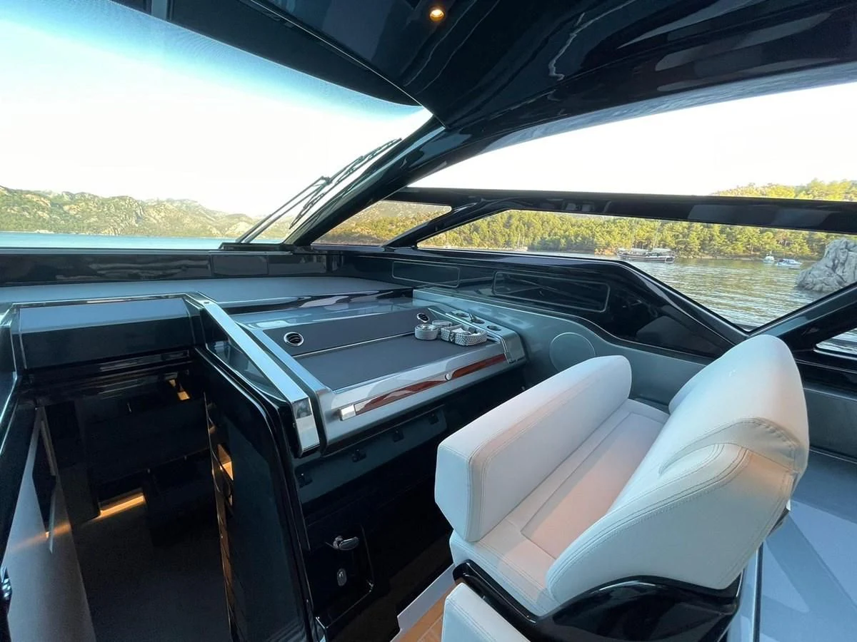 inside of a car aboard RIVA 68' DIABLE Yacht for Sale