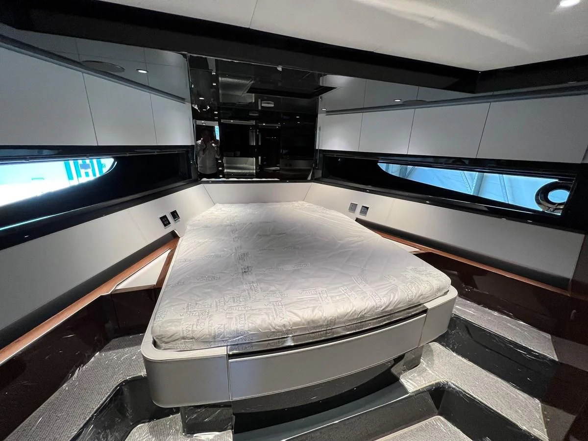 a couch in a room aboard RIVA 68' DIABLE Yacht for Sale