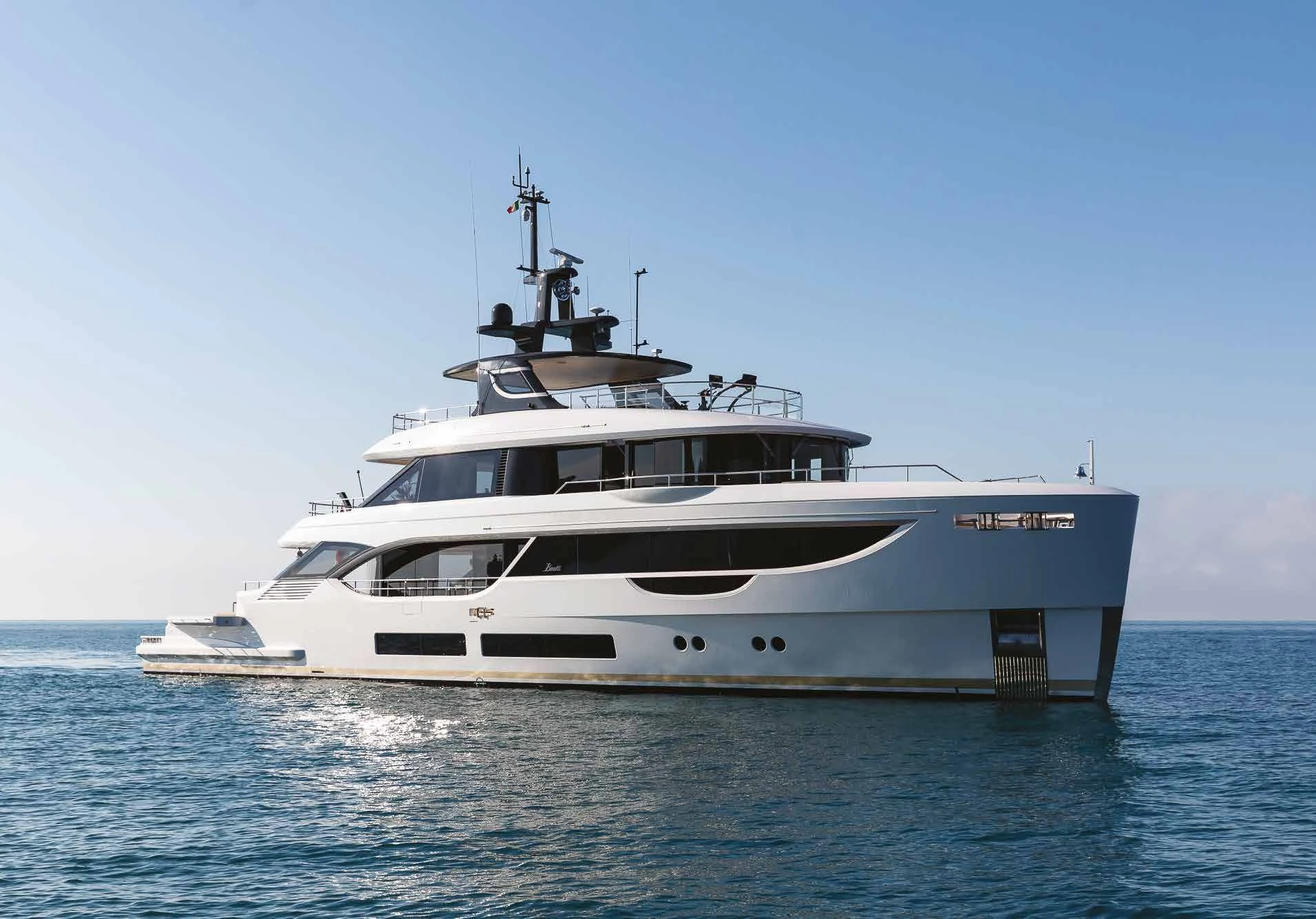 a white boat in the water aboard A+ Yacht for Charter