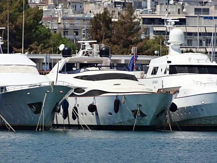 several boats docked at a pier aboard PAREAKI II Yacht for Sale