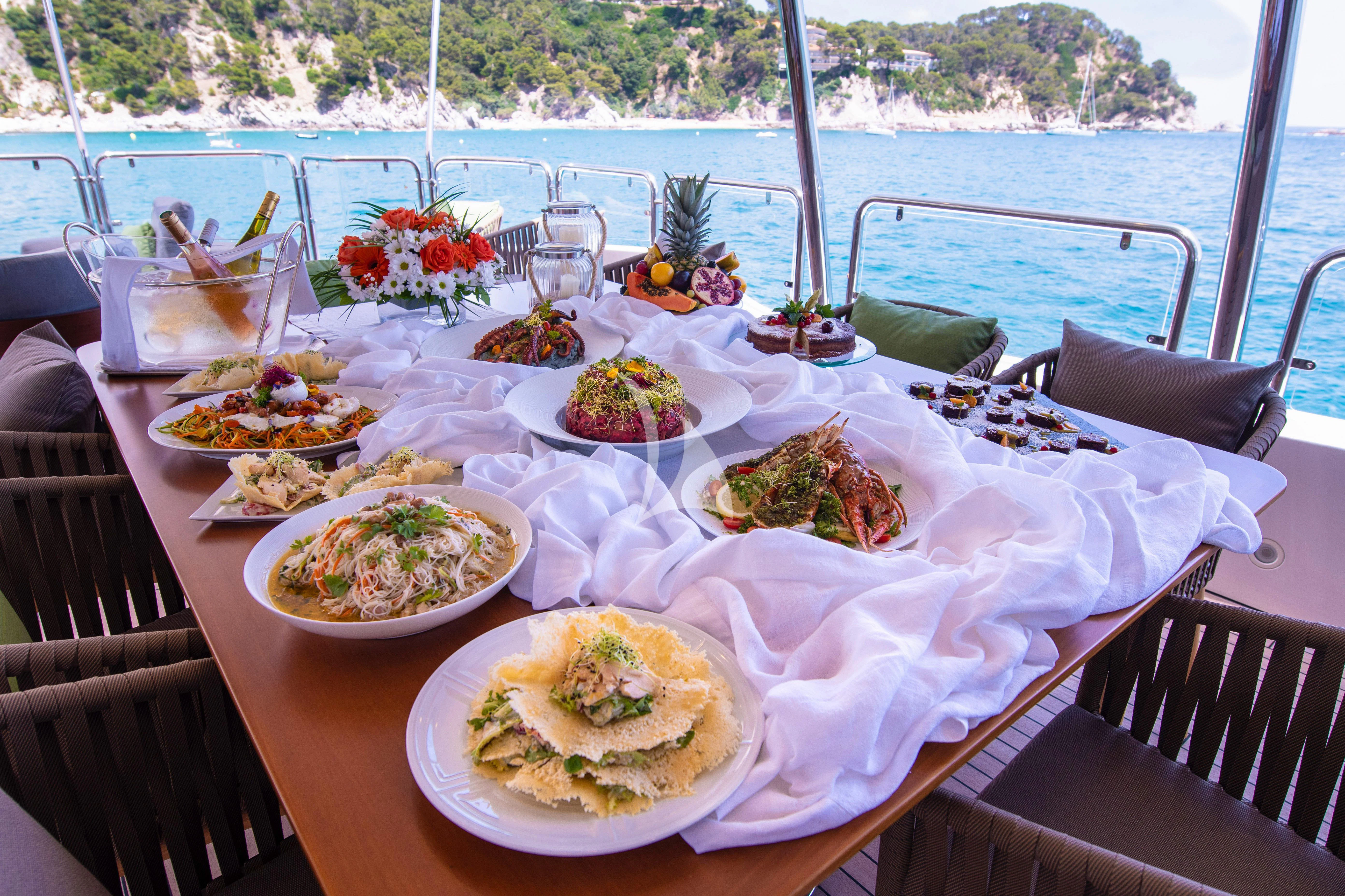 a table with food on it aboard EDESIA Yacht for Sale