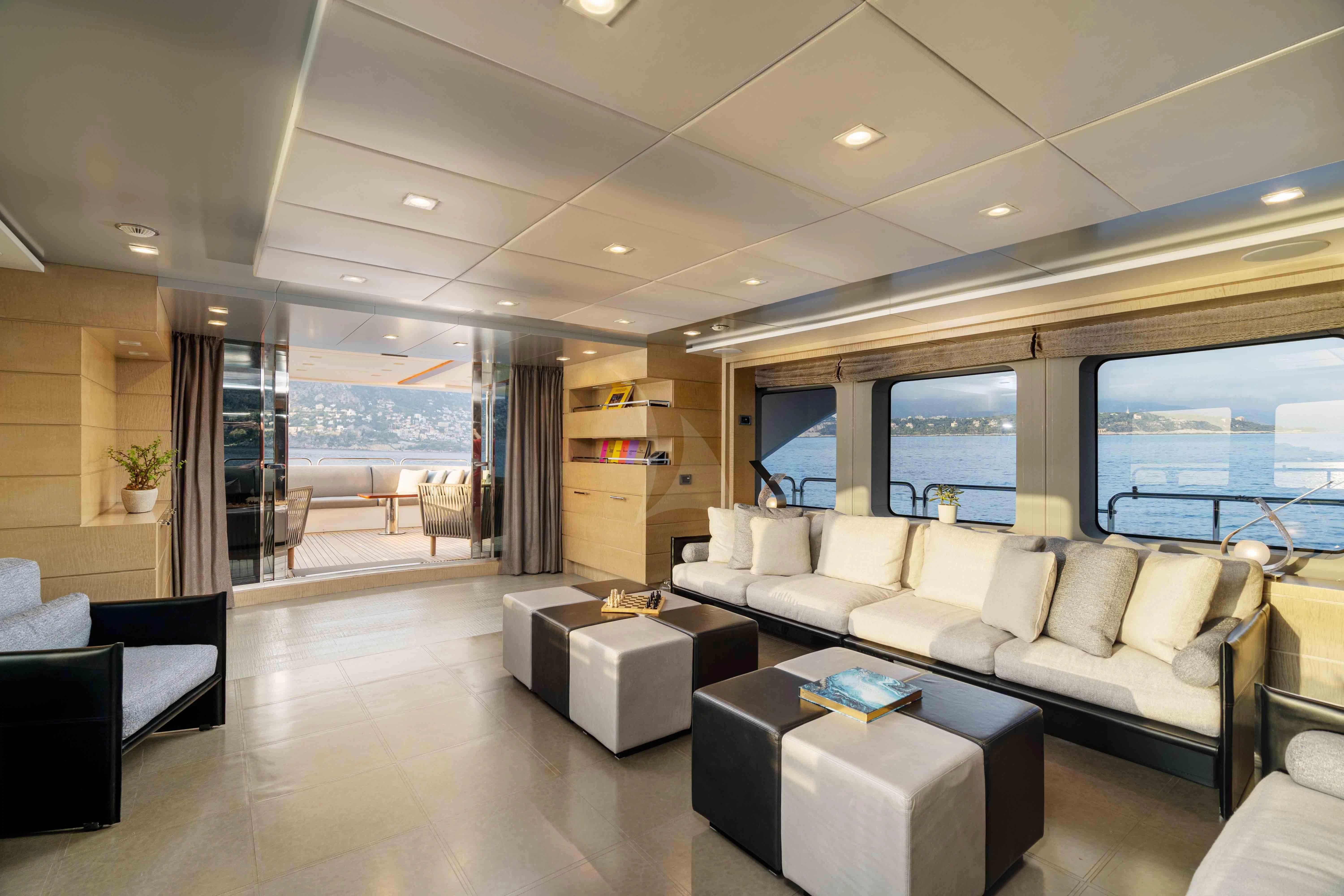 a living room with a large window aboard EDESIA Yacht for Sale