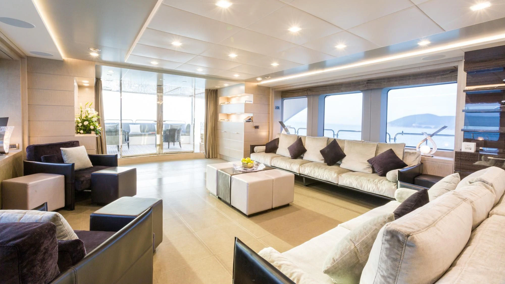 a living room with a large window aboard EDESIA Yacht for Sale