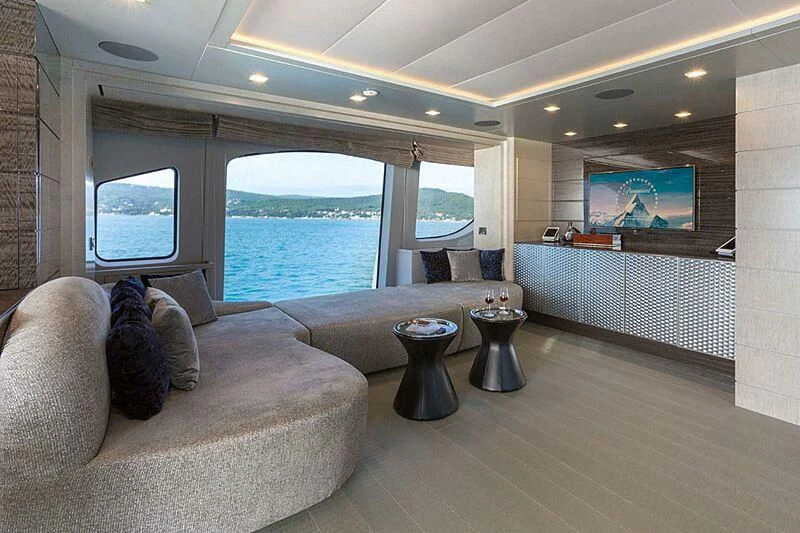 a living room with a large window aboard EDESIA Yacht for Sale