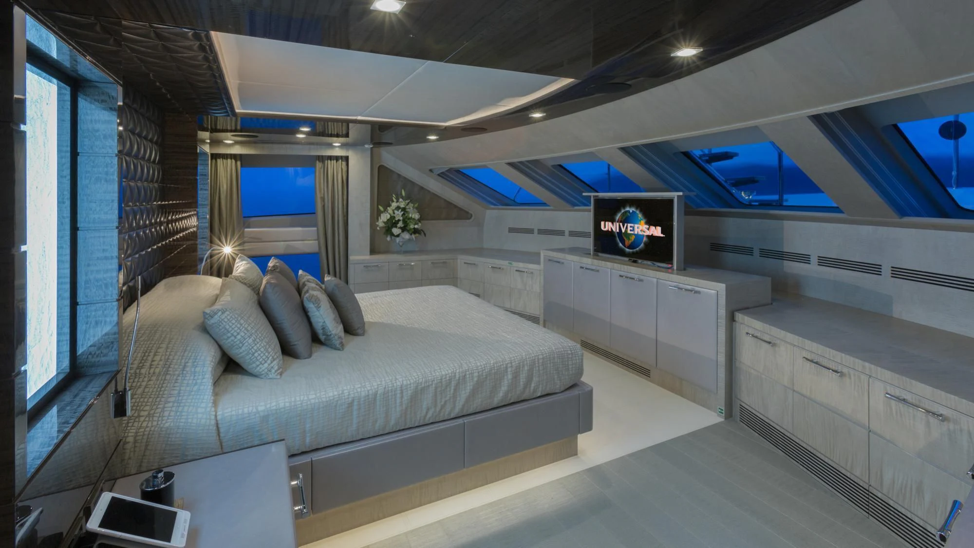 a room with a bed and a tv aboard EDESIA Yacht for Sale