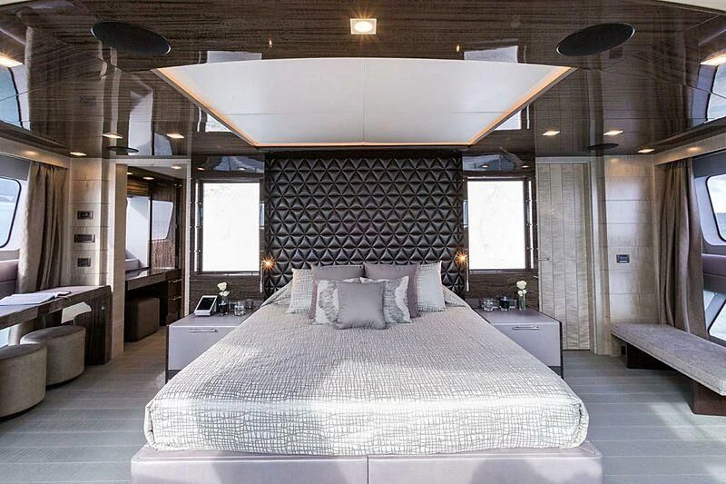 a large bed in a room aboard EDESIA Yacht for Sale
