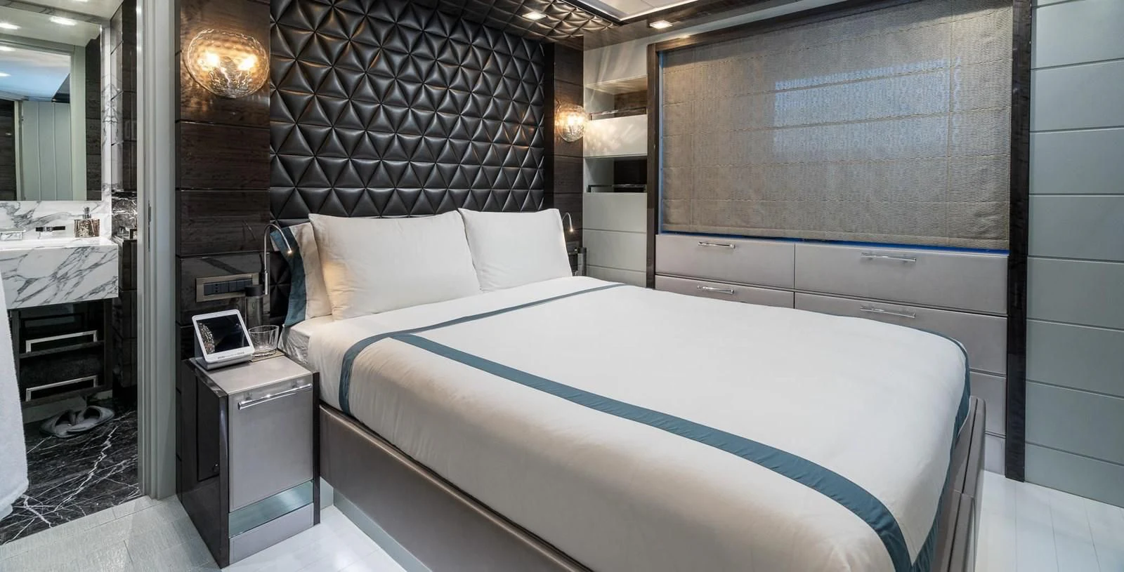 a bed in a room aboard EDESIA Yacht for Sale