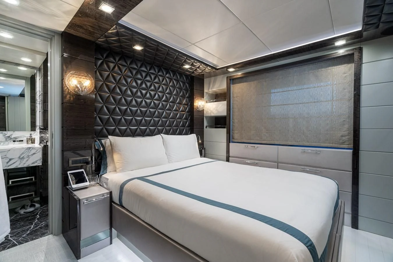 a bed in a room aboard EDESIA Yacht for Sale