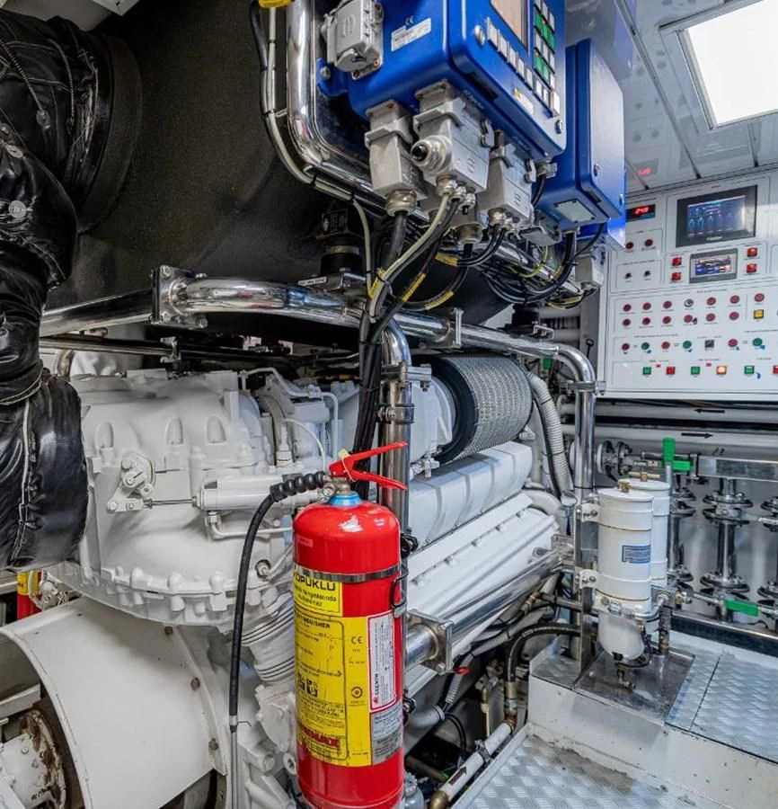 a machine with a red and yellow label aboard EDESIA Yacht for Sale