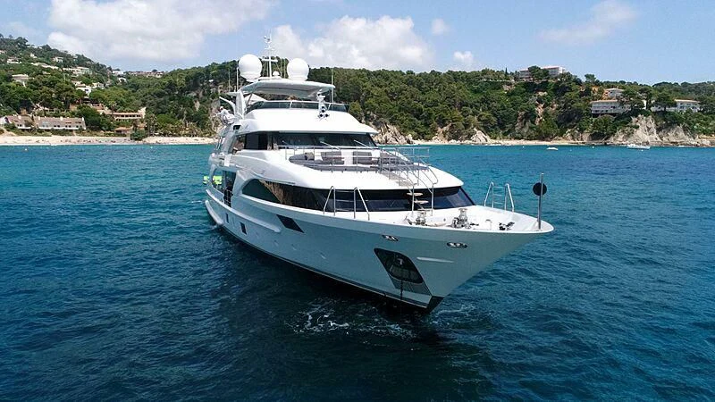 a white boat in the water aboard EDESIA Yacht for Sale