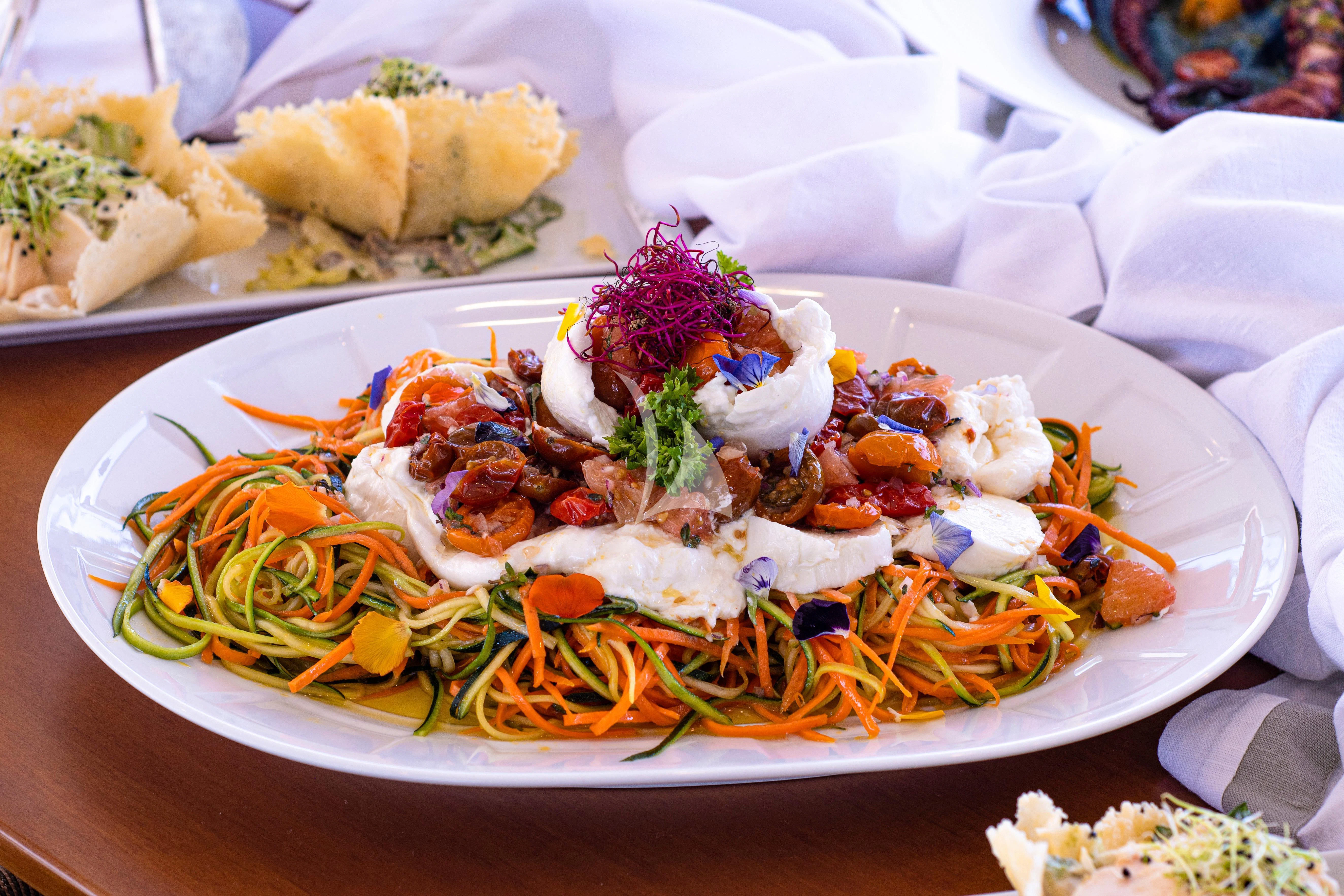 a plate of food aboard EDESIA Yacht for Sale