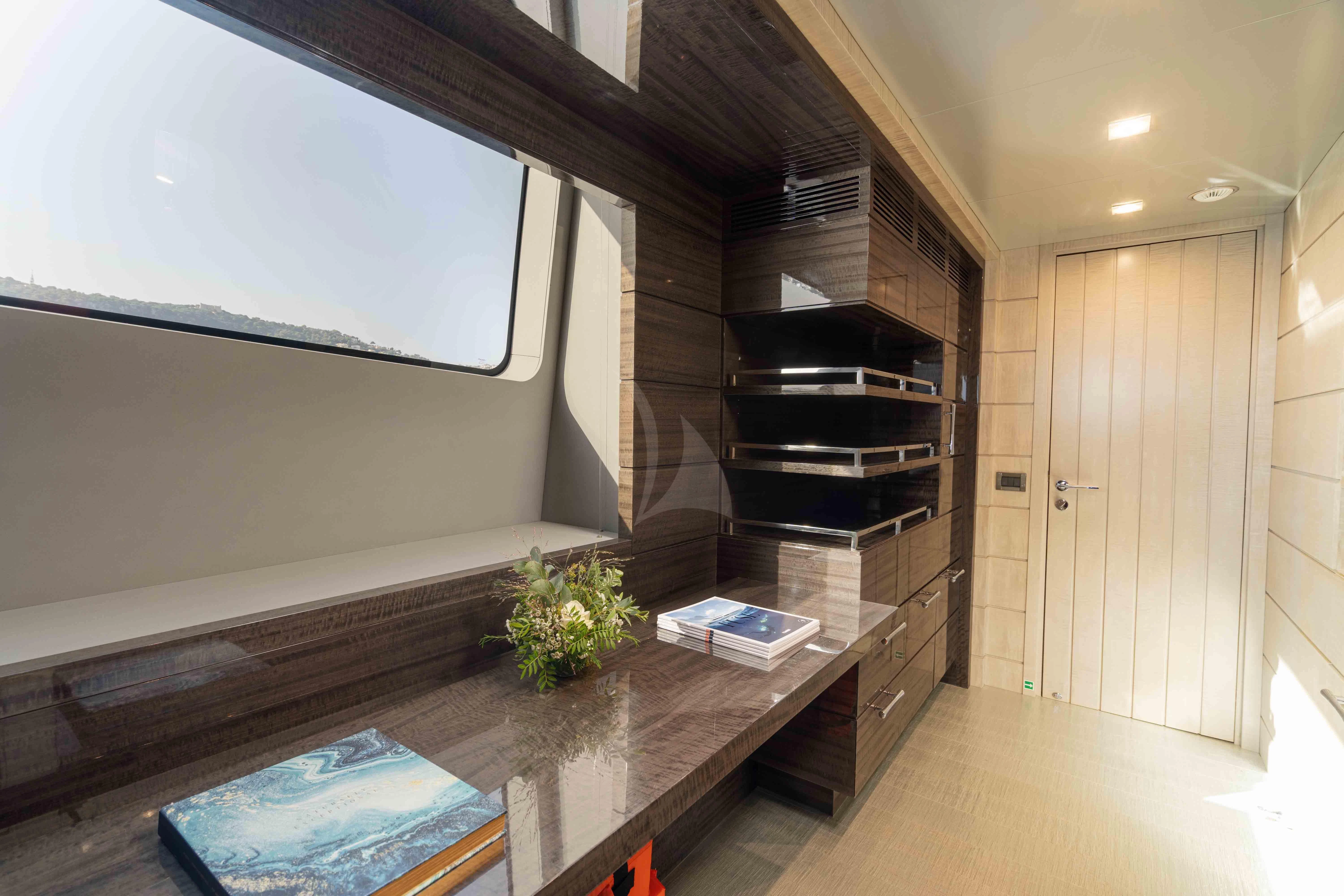 a large kitchen with a large island aboard EDESIA Yacht for Sale