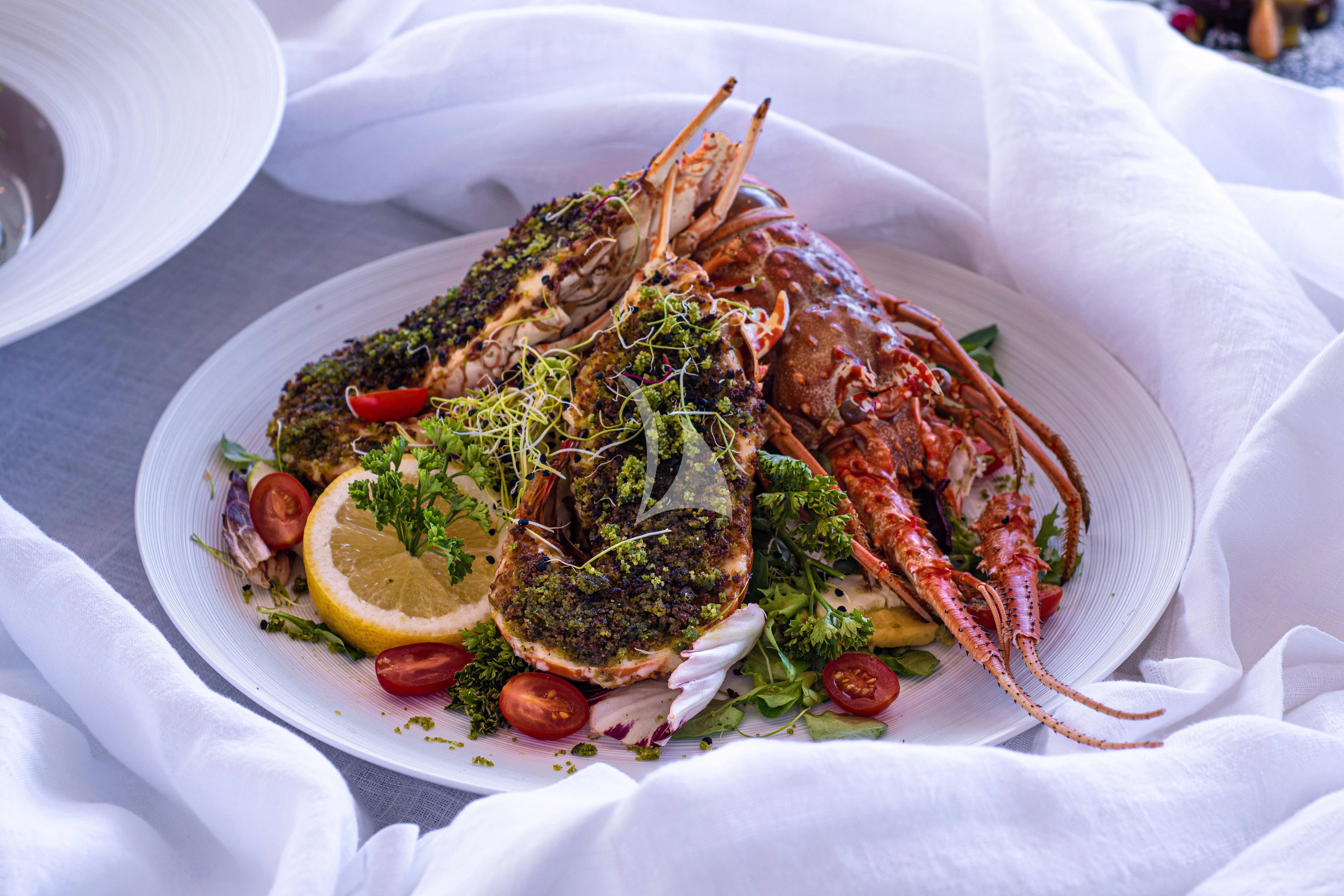 a plate of food aboard EDESIA Yacht for Sale