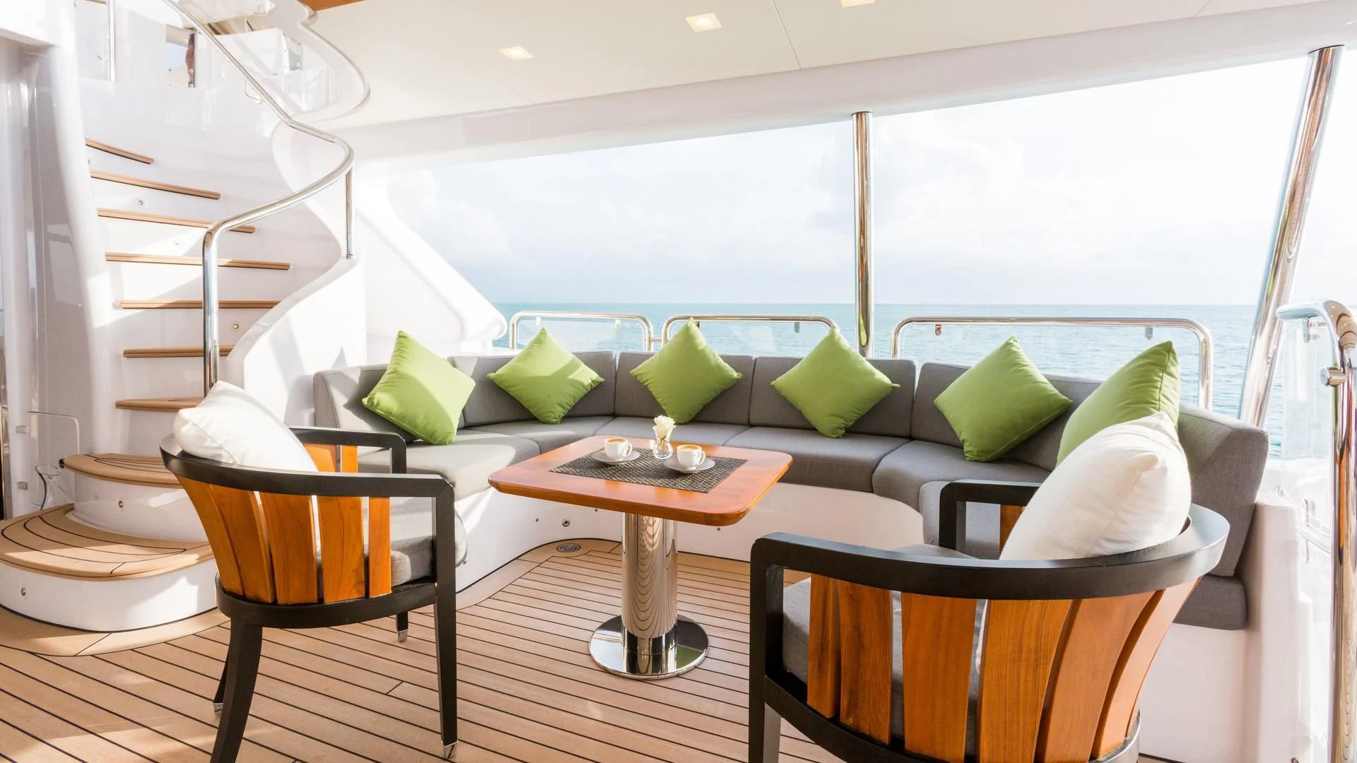 a living room with a couch and a table aboard EDESIA Yacht for Sale