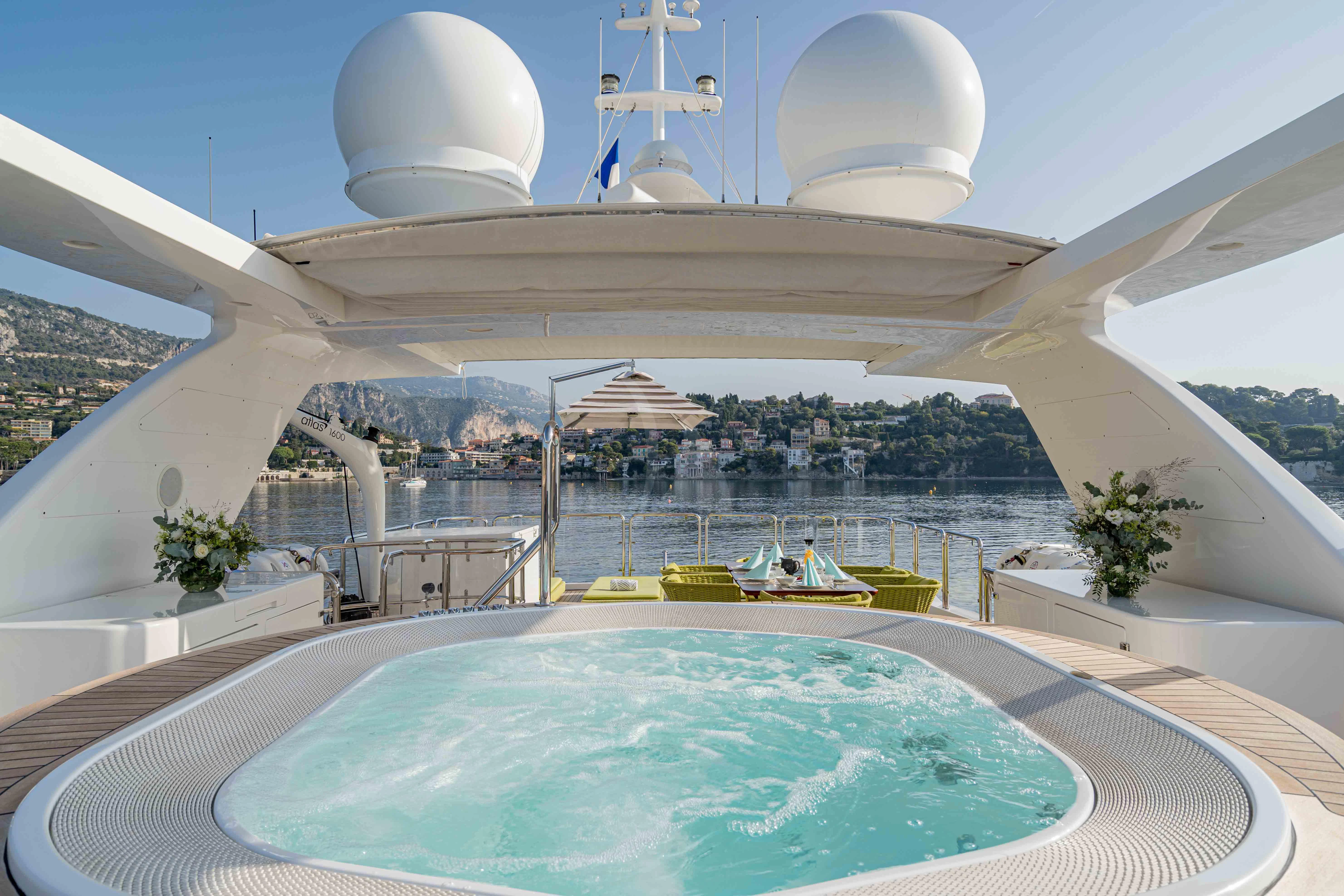 a swimming pool with a large domed roof and a large white dome aboard EDESIA Yacht for Sale