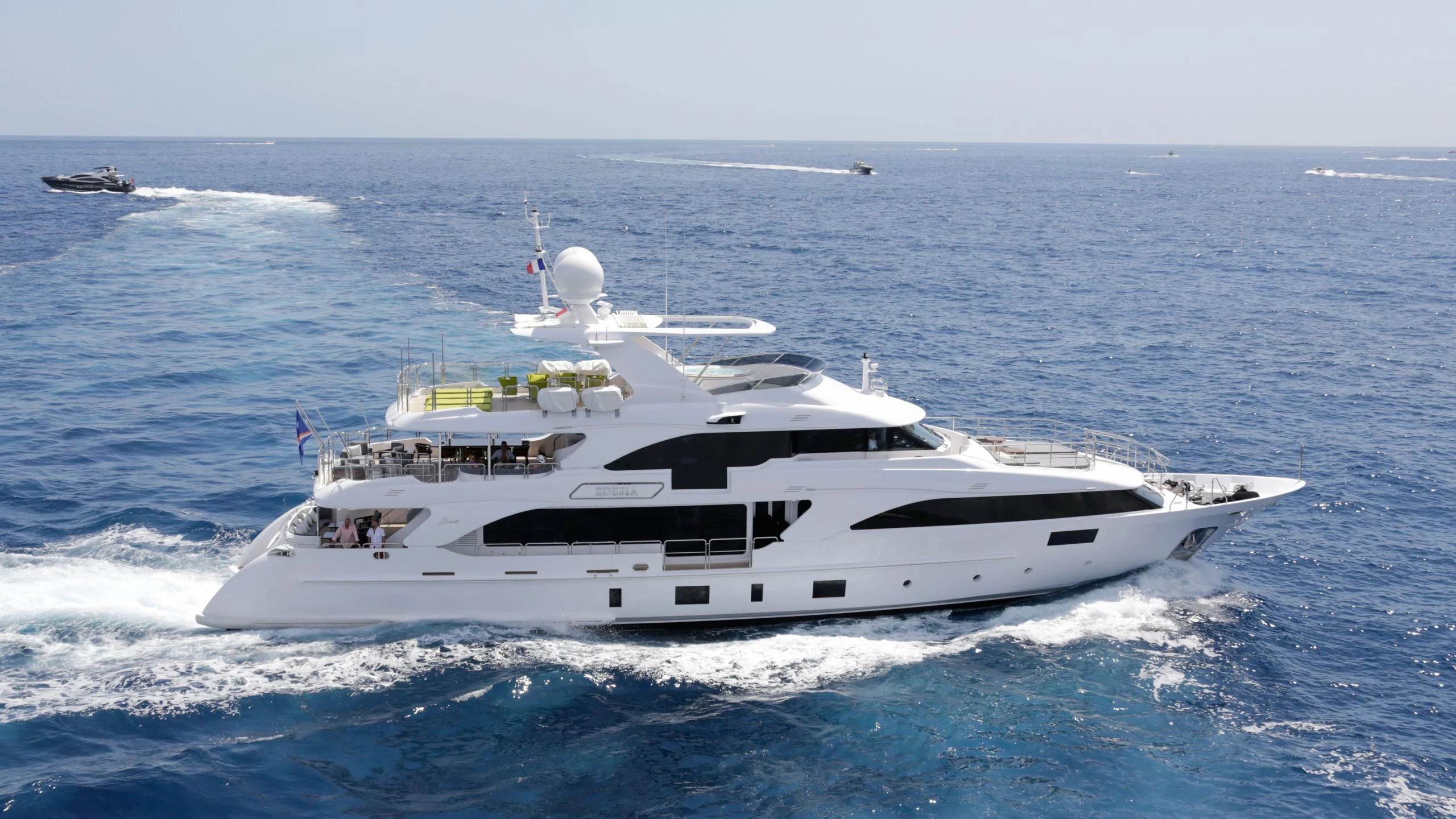 a white yacht in the ocean aboard EDESIA Yacht for Sale