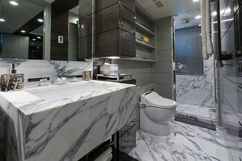 a bathroom with a large mirror aboard EDESIA Yacht for Sale