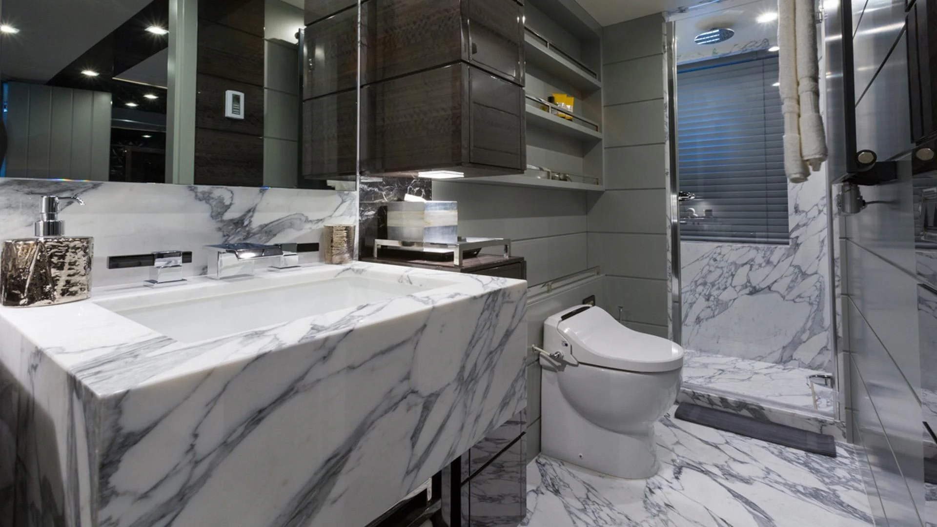 a bathroom with a large tub and a toilet aboard EDESIA Yacht for Sale