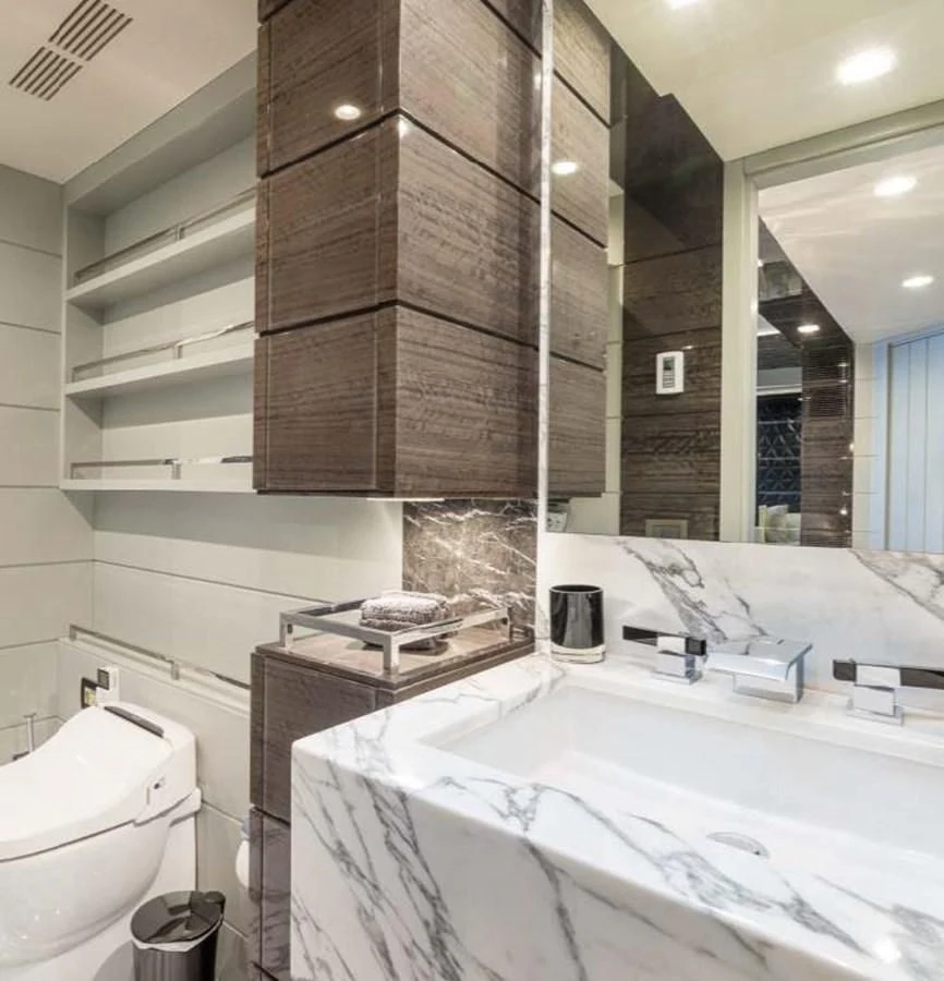 a bathroom with a large mirror aboard EDESIA Yacht for Sale