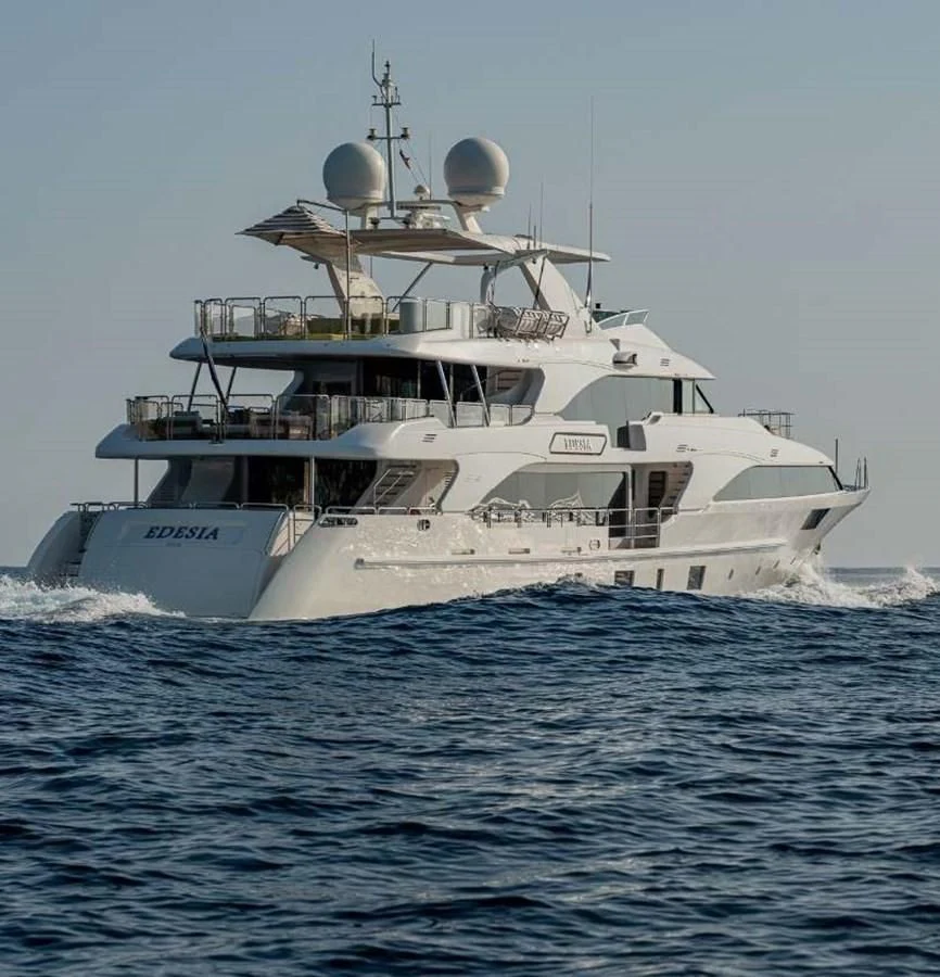 a large white ship in the water aboard EDESIA Yacht for Sale
