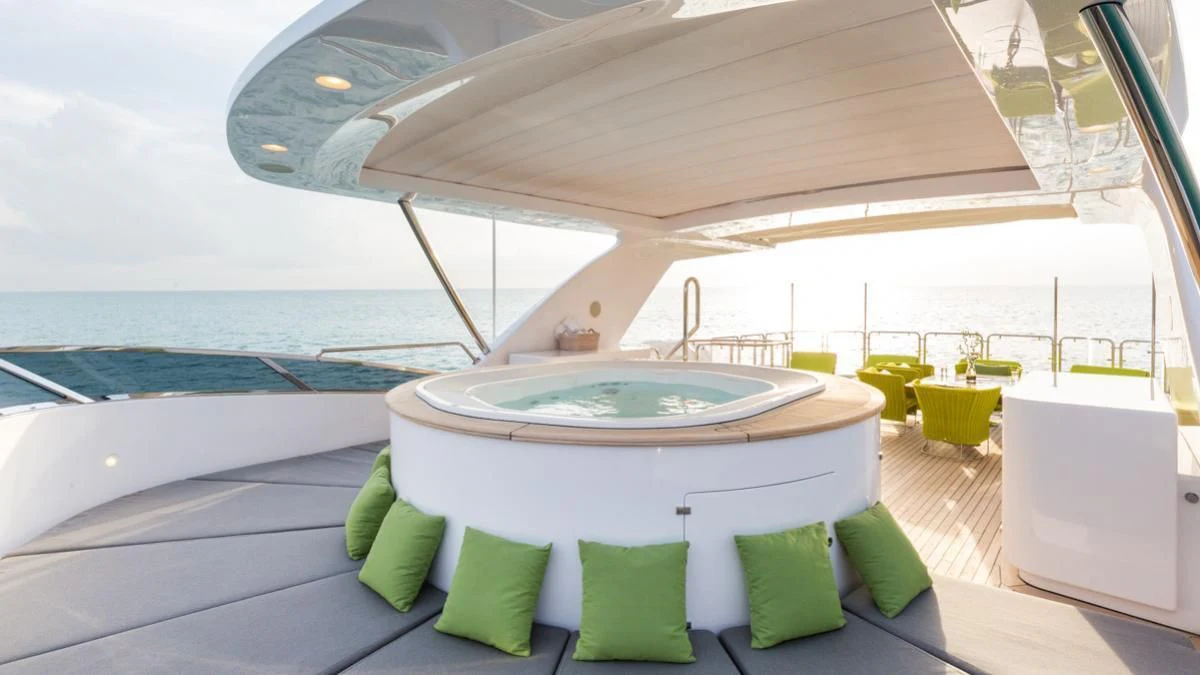 a swimming pool with a large jacuzzi aboard EDESIA Yacht for Sale