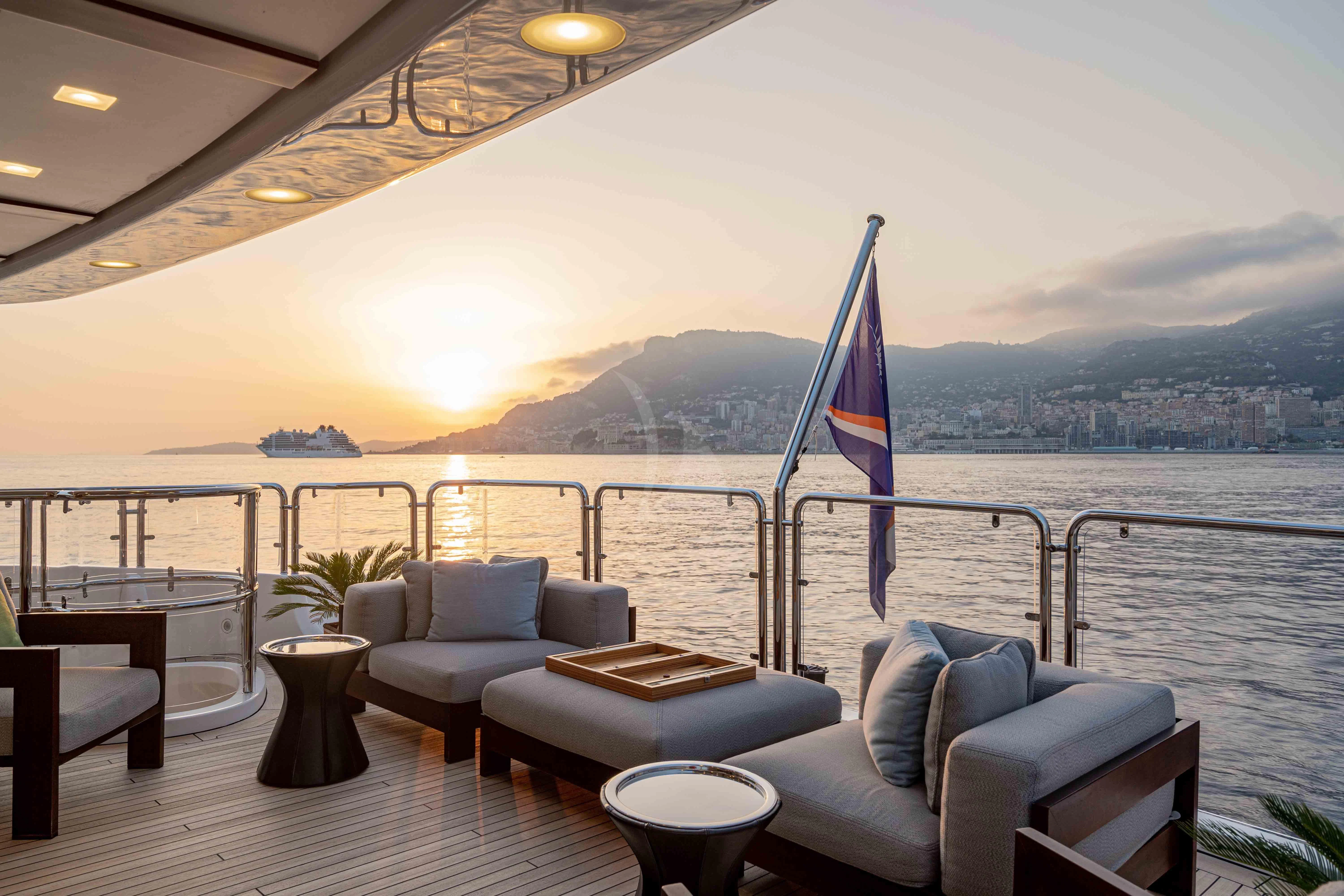 a room with a view of a city and a body of water aboard EDESIA Yacht for Sale