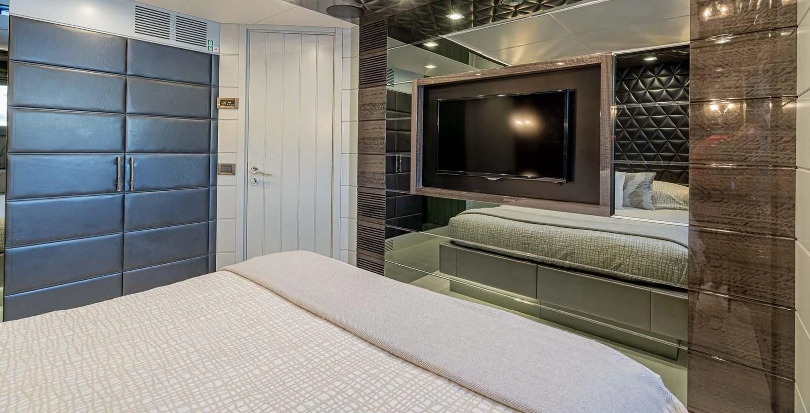 a bed in a room aboard EDESIA Yacht for Sale