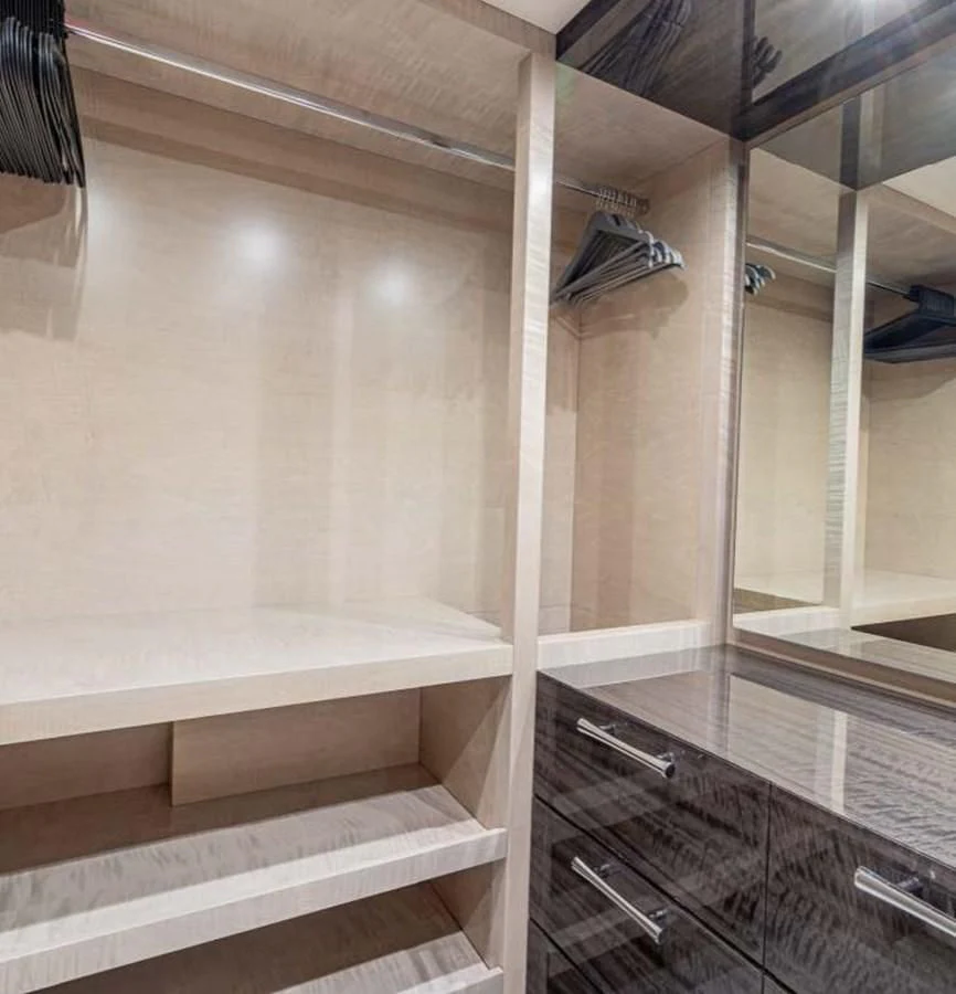 a room with a glass door and a shelf with a mirror aboard EDESIA Yacht for Sale