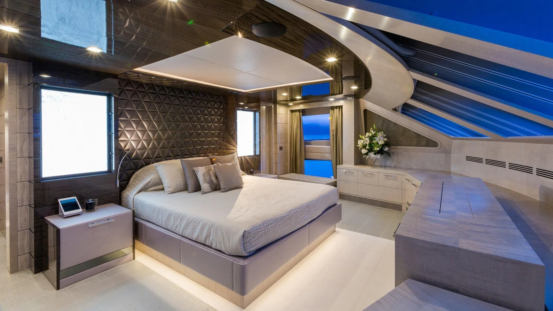 a room with a bed and a window aboard EDESIA Yacht for Sale