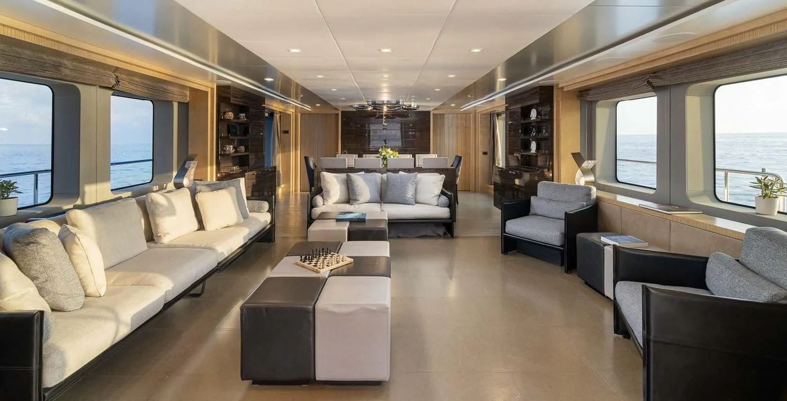 a living room with a couch and a table aboard EDESIA Yacht for Sale