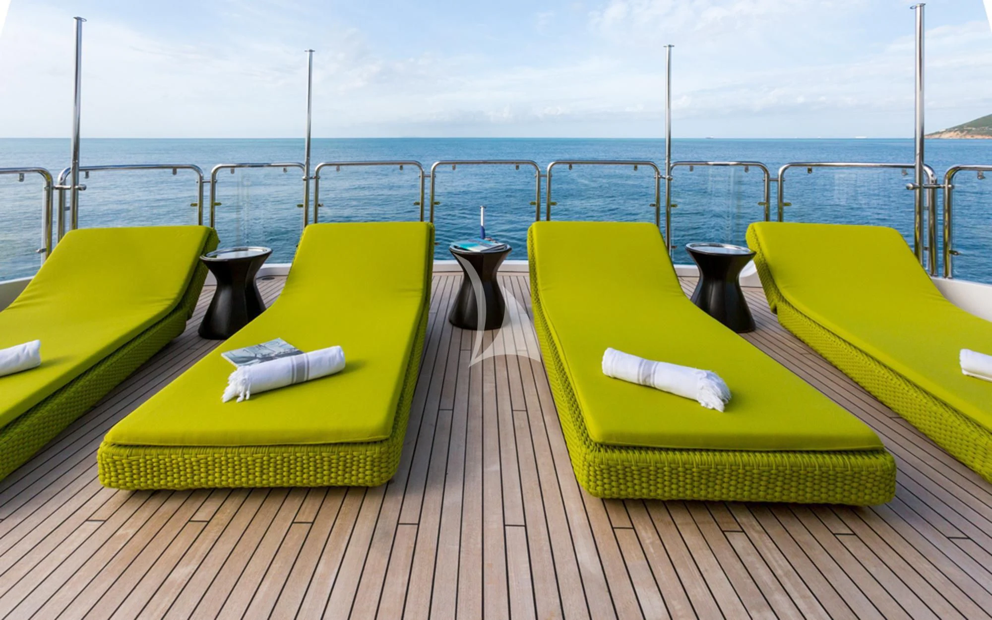 a deck with chairs and tables on it aboard EDESIA Yacht for Sale