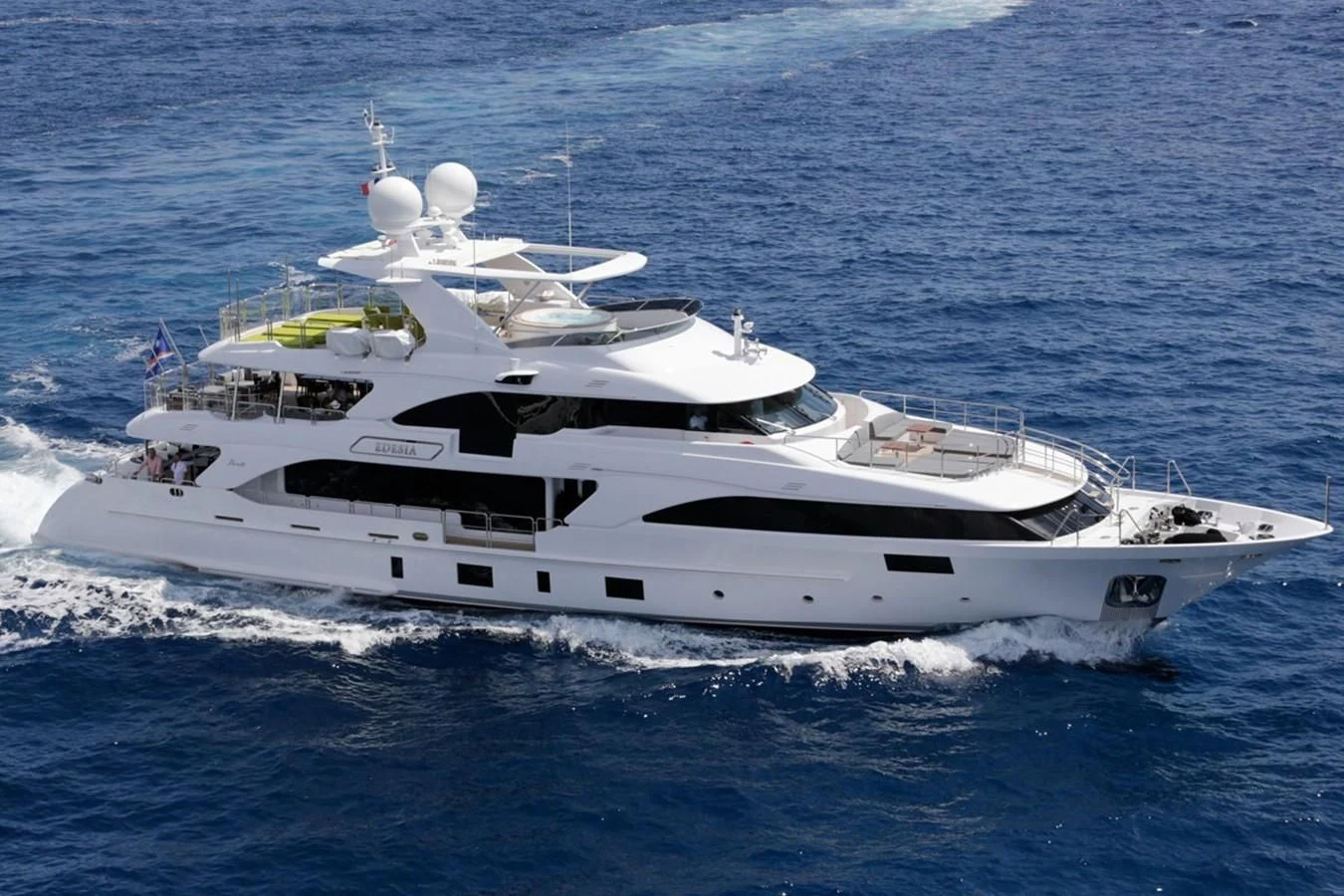 a white yacht in the water aboard EDESIA Yacht for Sale