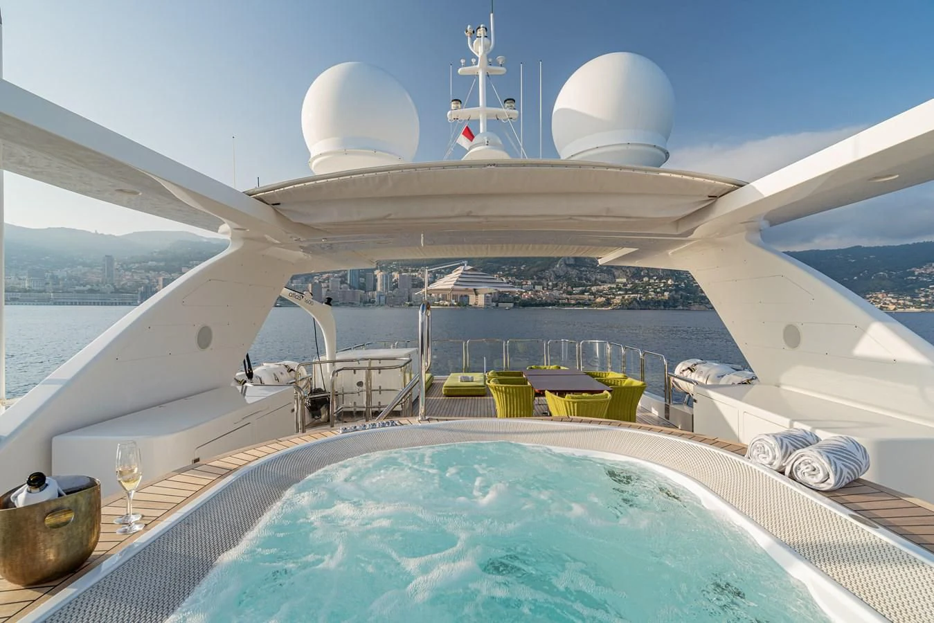 a large white ship with a pool aboard EDESIA Yacht for Sale