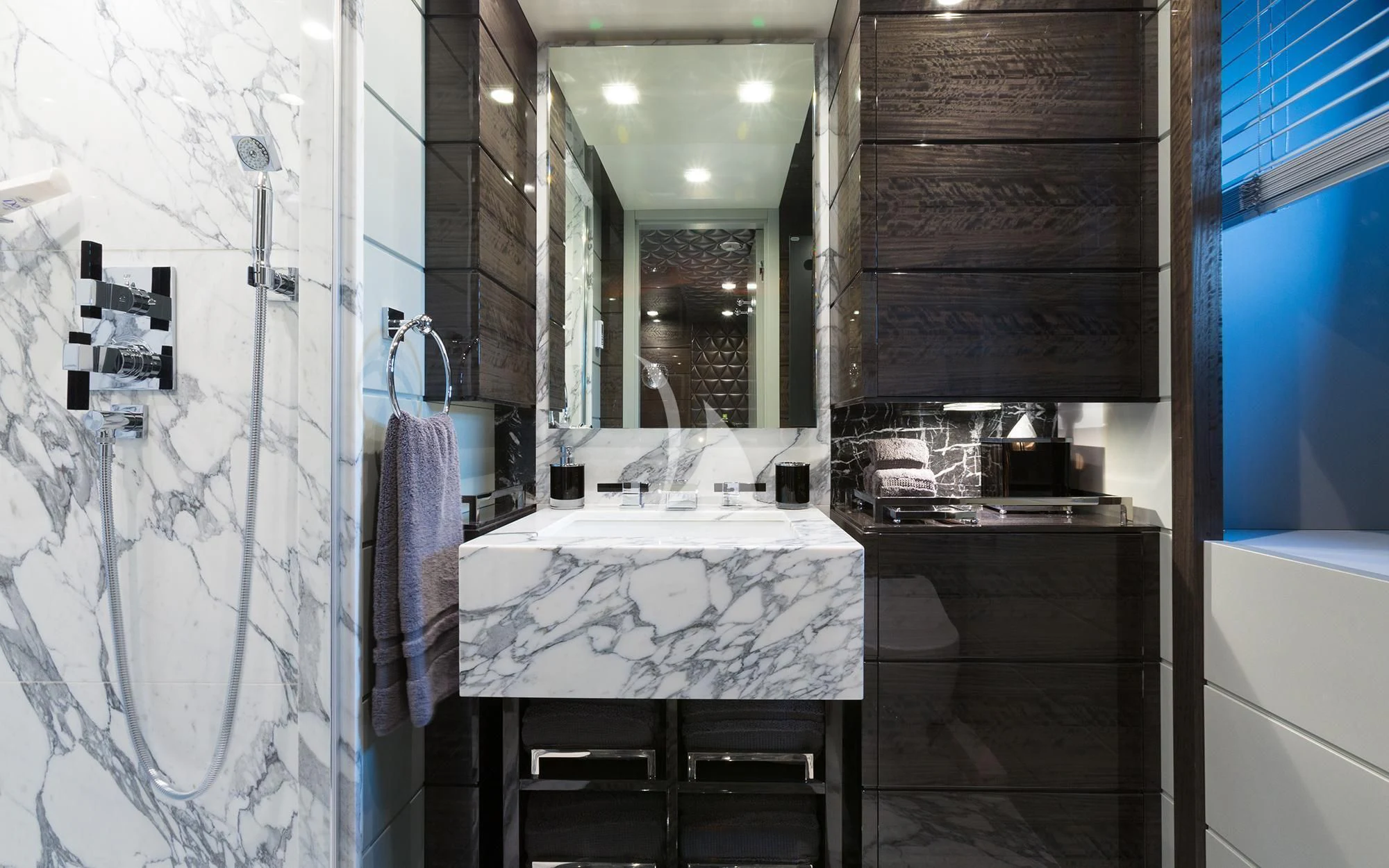 a bathroom with a large marble counter aboard EDESIA Yacht for Sale