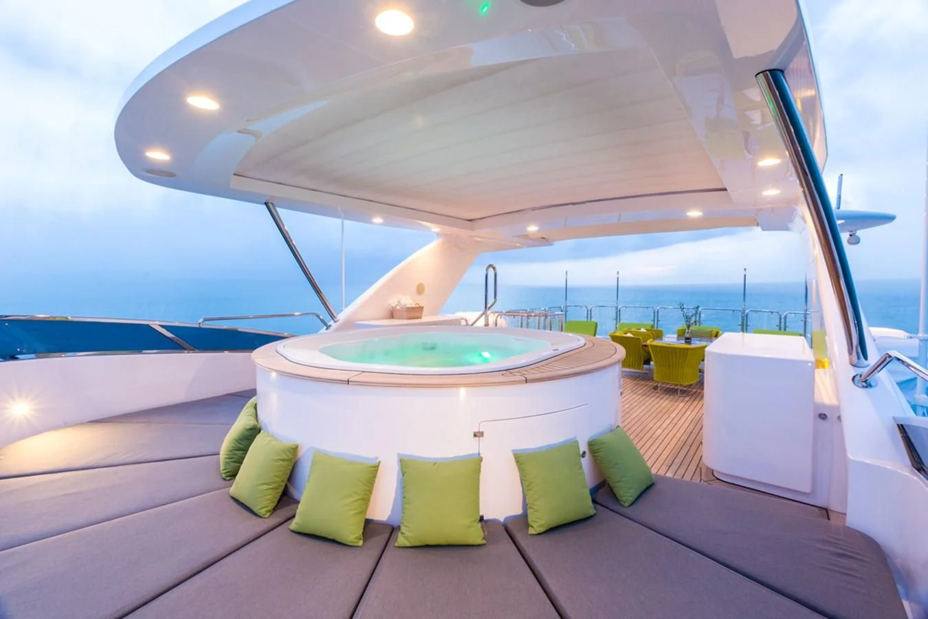 a room with a table and chairs aboard EDESIA Yacht for Sale