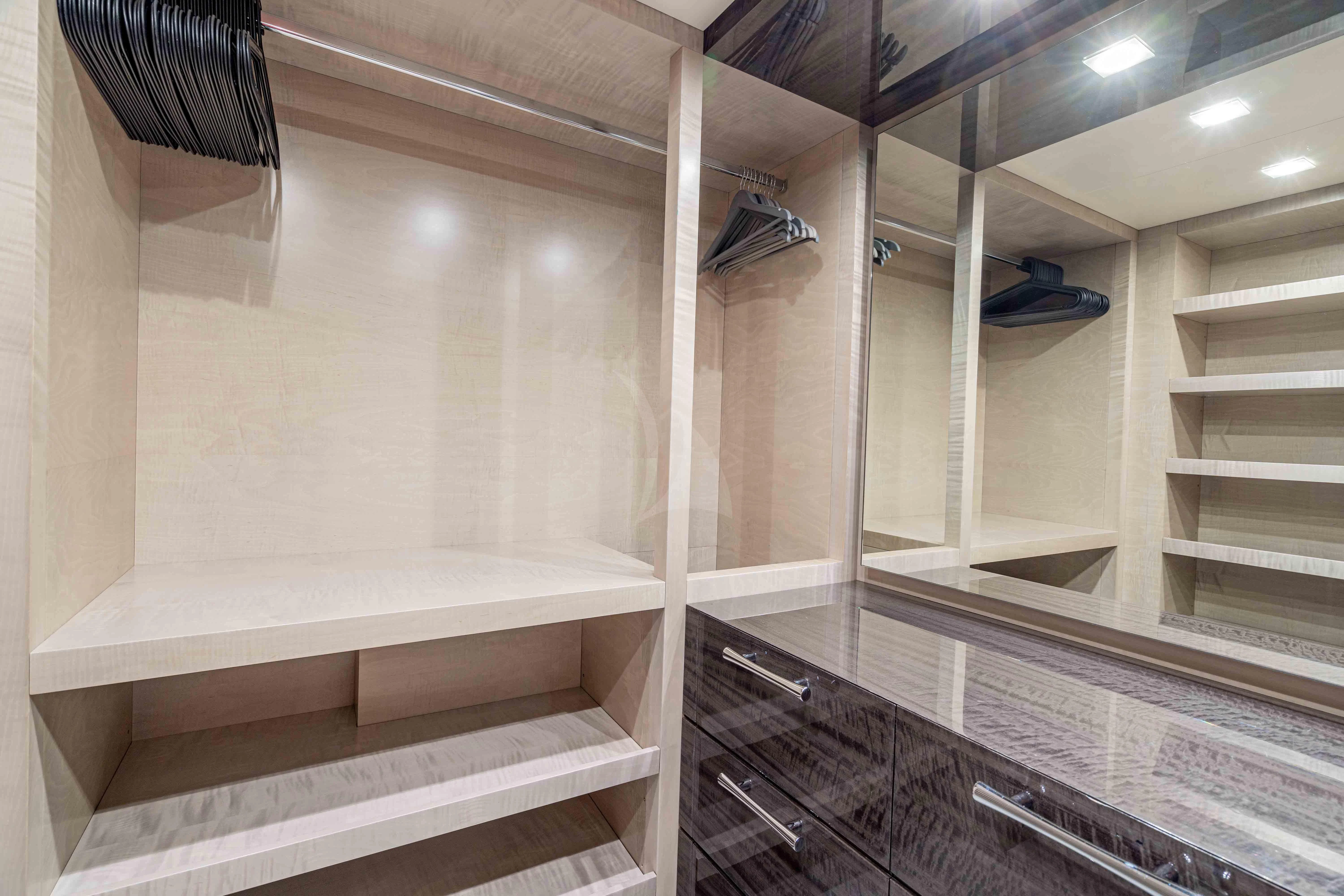 a room with a shelf and a mirror aboard EDESIA Yacht for Sale