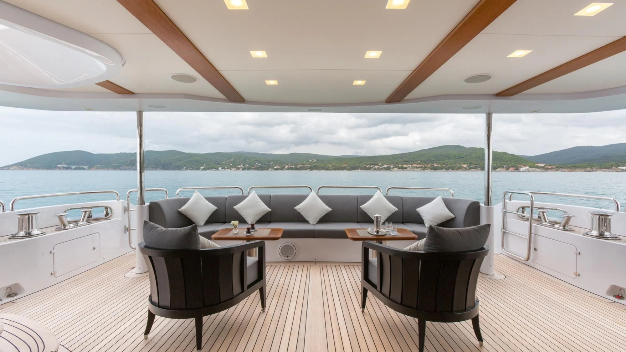 a room with a table and chairs aboard EDESIA Yacht for Sale