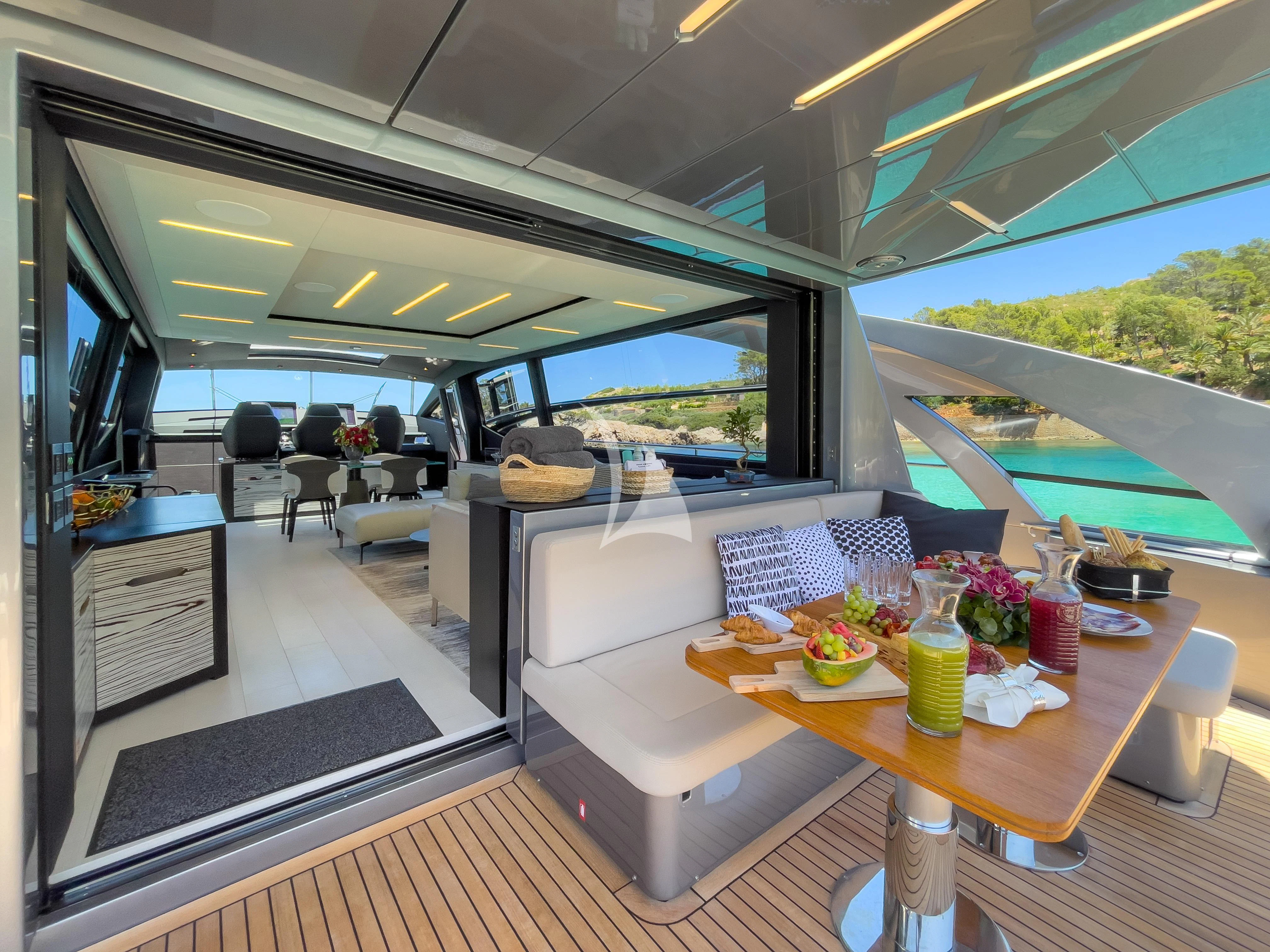 a table with food on it aboard BEYOND Yacht for Sale