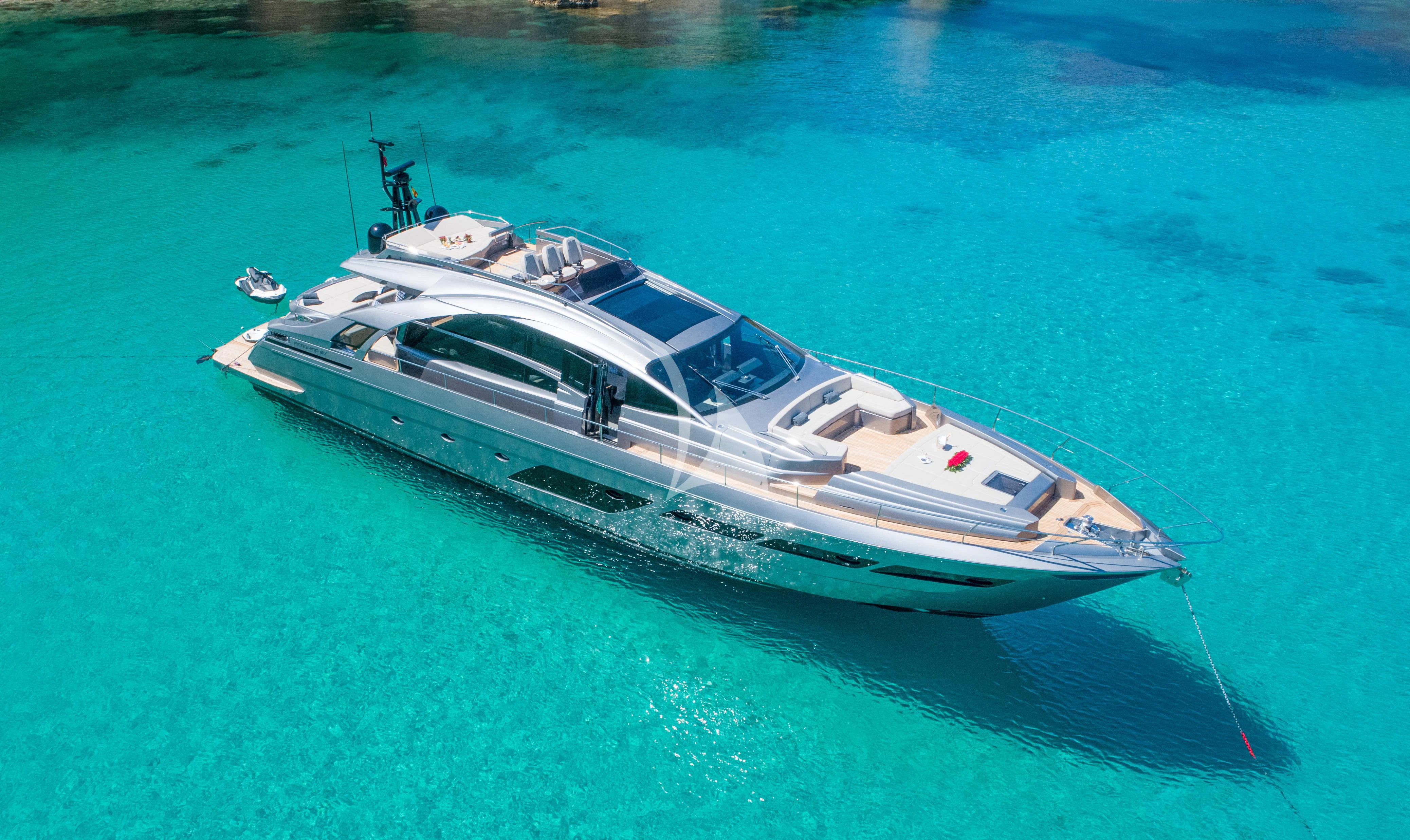 a white boat on water aboard BEYOND Yacht for Sale