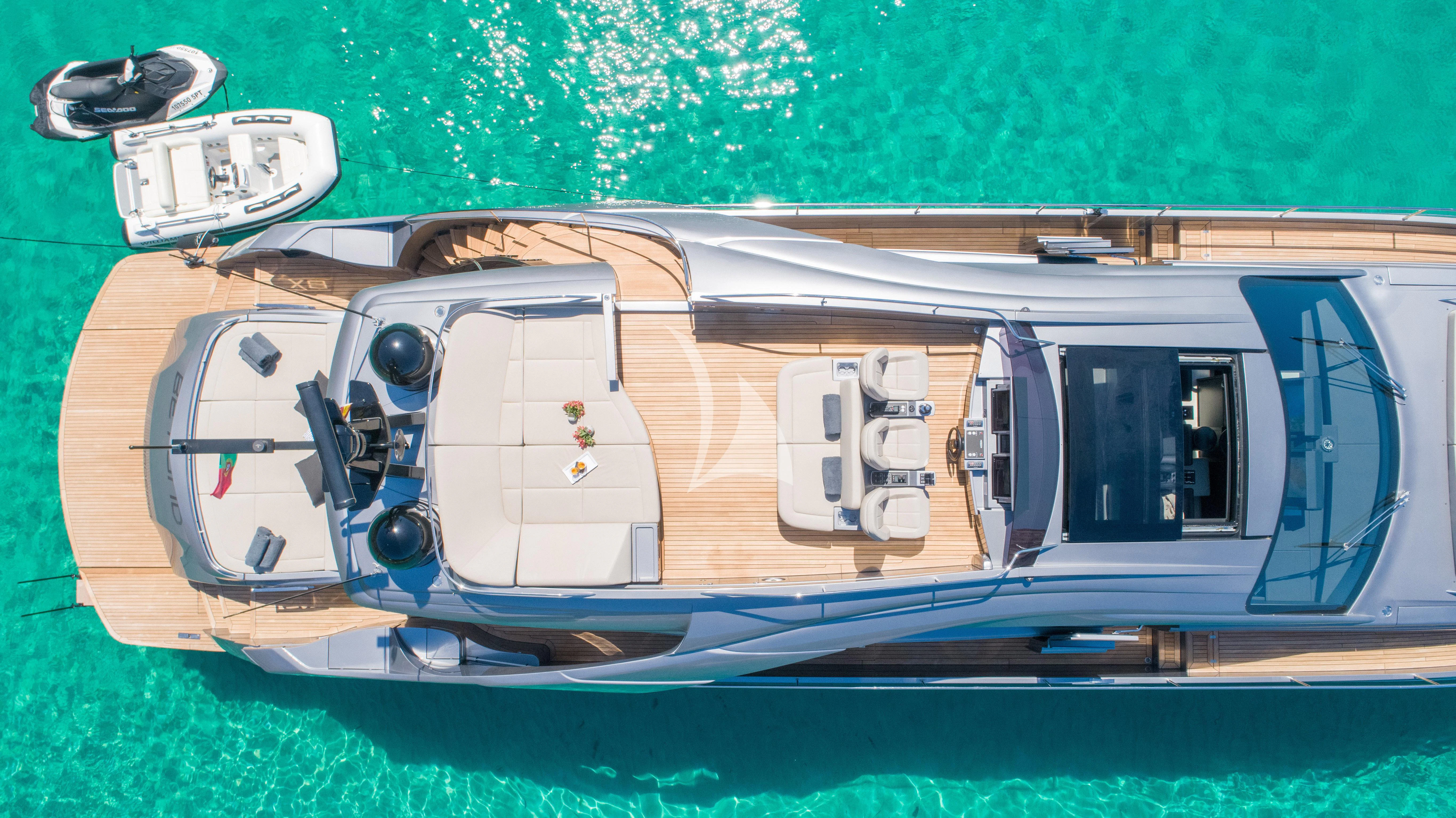 a car with a door open aboard BEYOND Yacht for Sale
