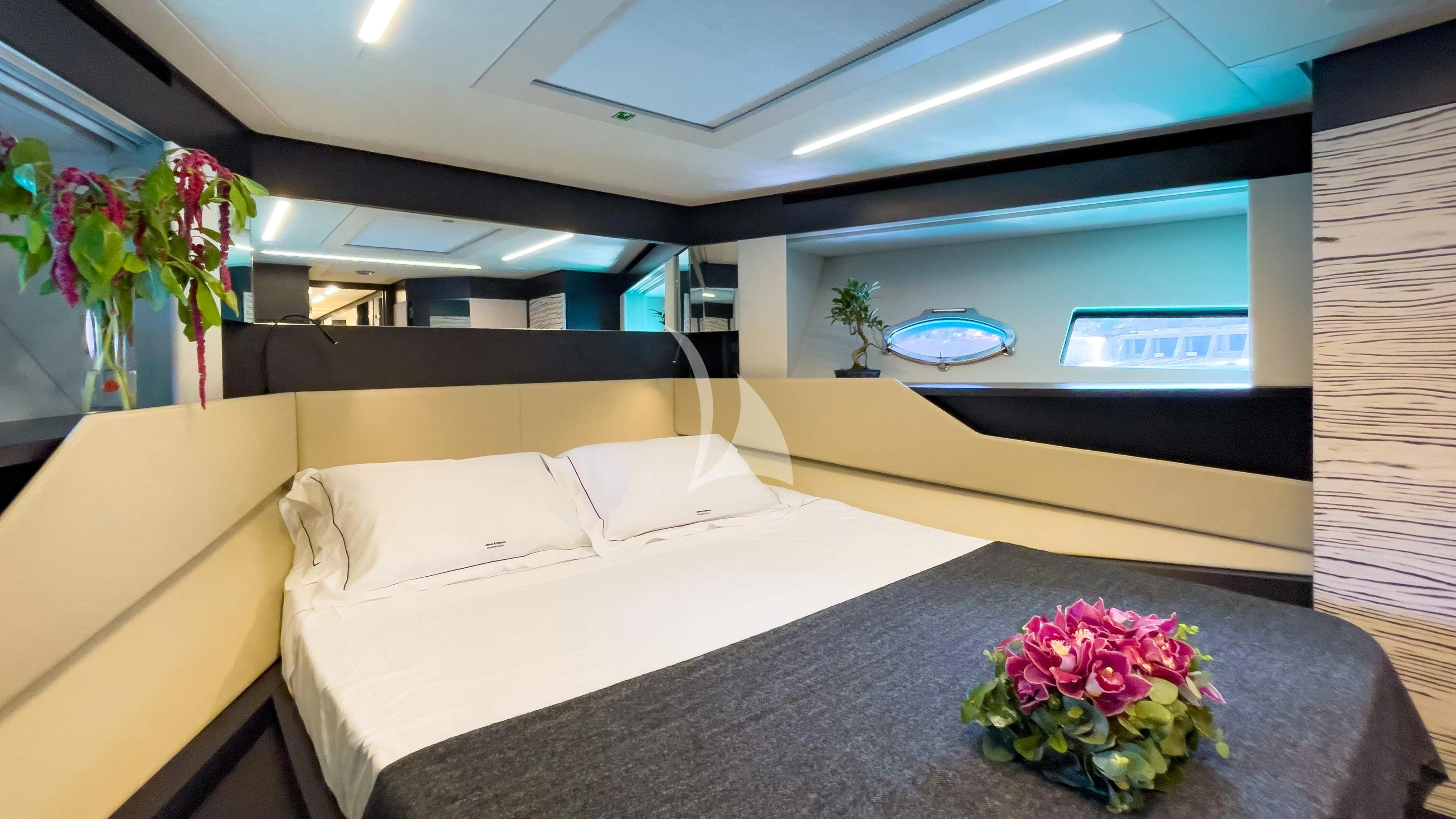 a bed in a room aboard BEYOND Yacht for Sale